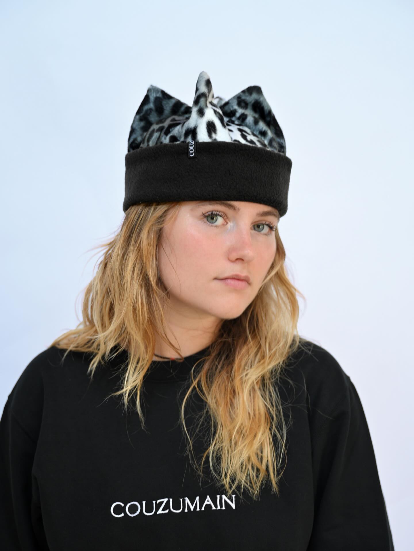 Textured-Tousled-Blonde-Locks-with-Animal-Print-Beanie