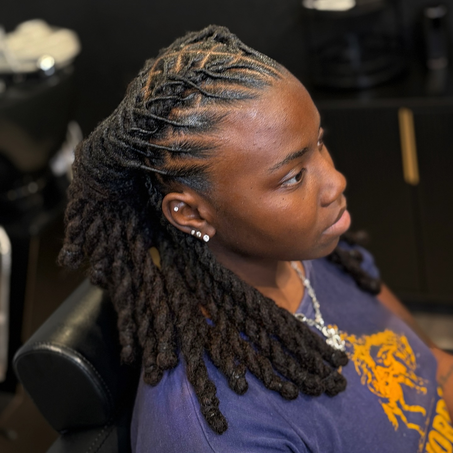 Artistic Cornrowed Top with Free-Hanging Thick Twists