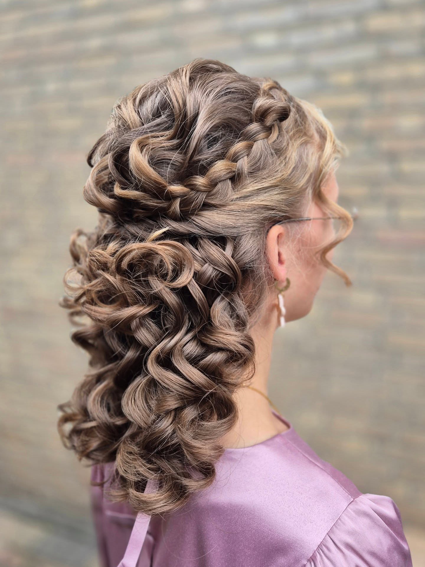 Cascading Curly Half-Up Braided Elegance