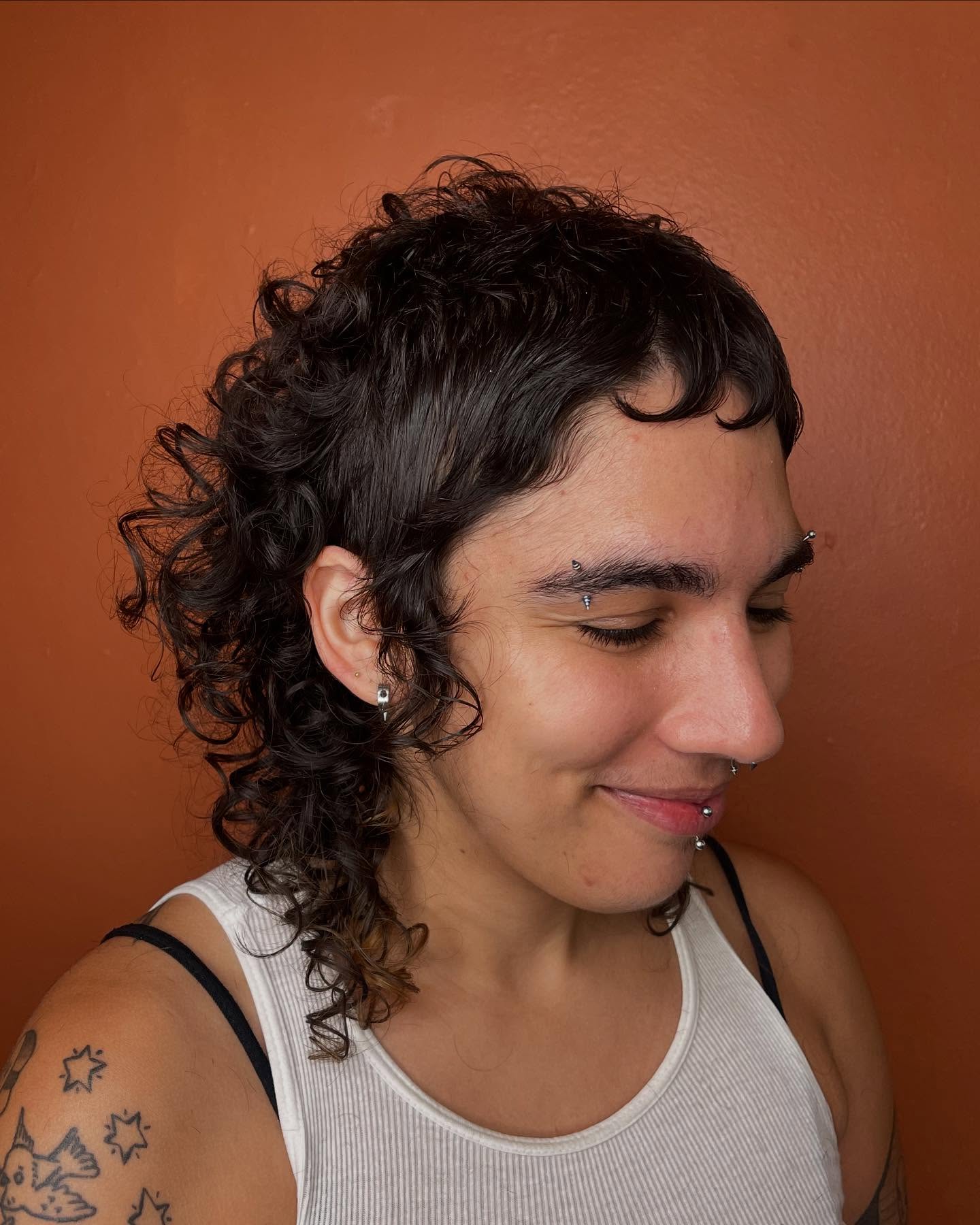 Casual Tousled Curly Mullet with Natural Highlights
