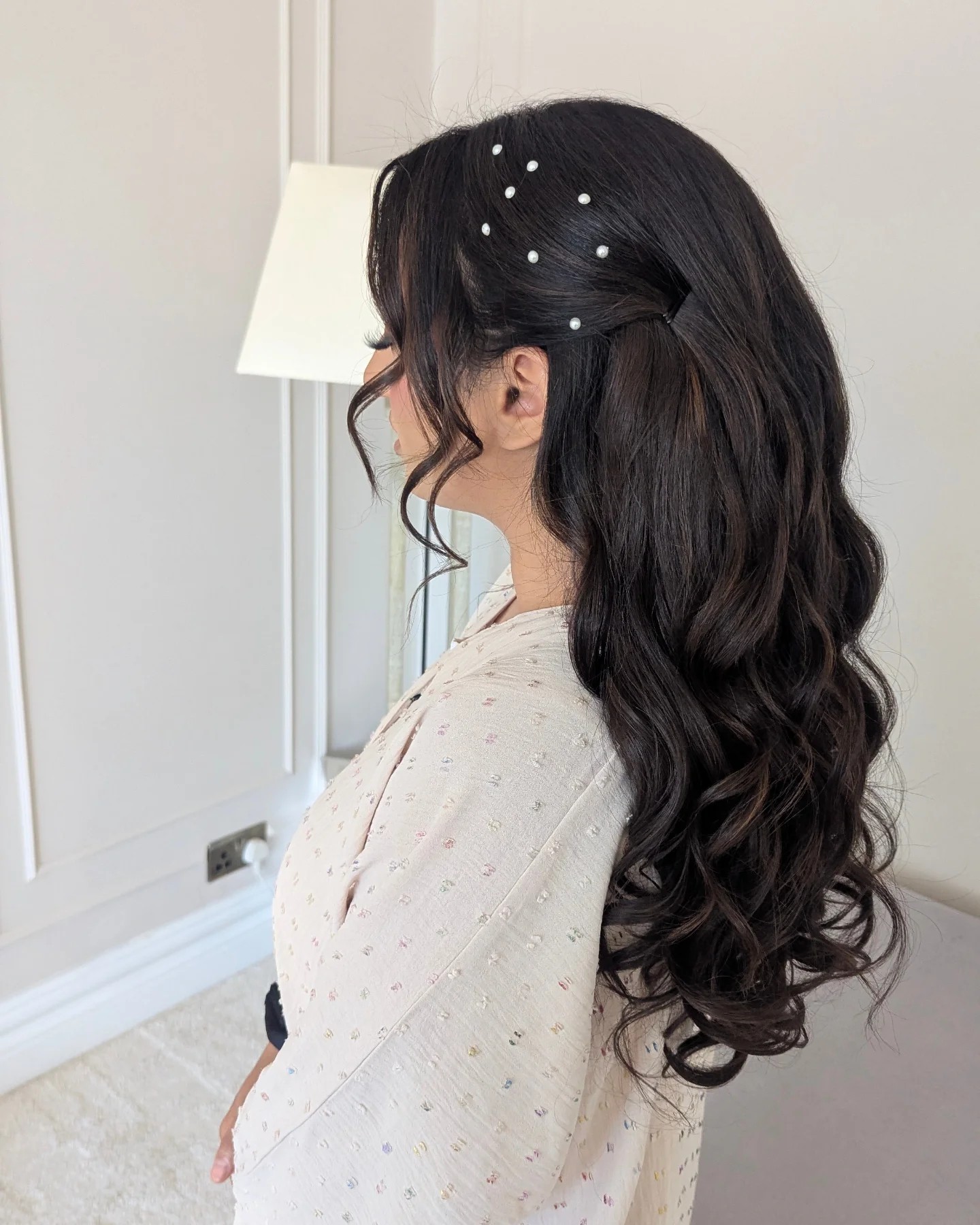 Chic Cascading Curls with Pearl Accents