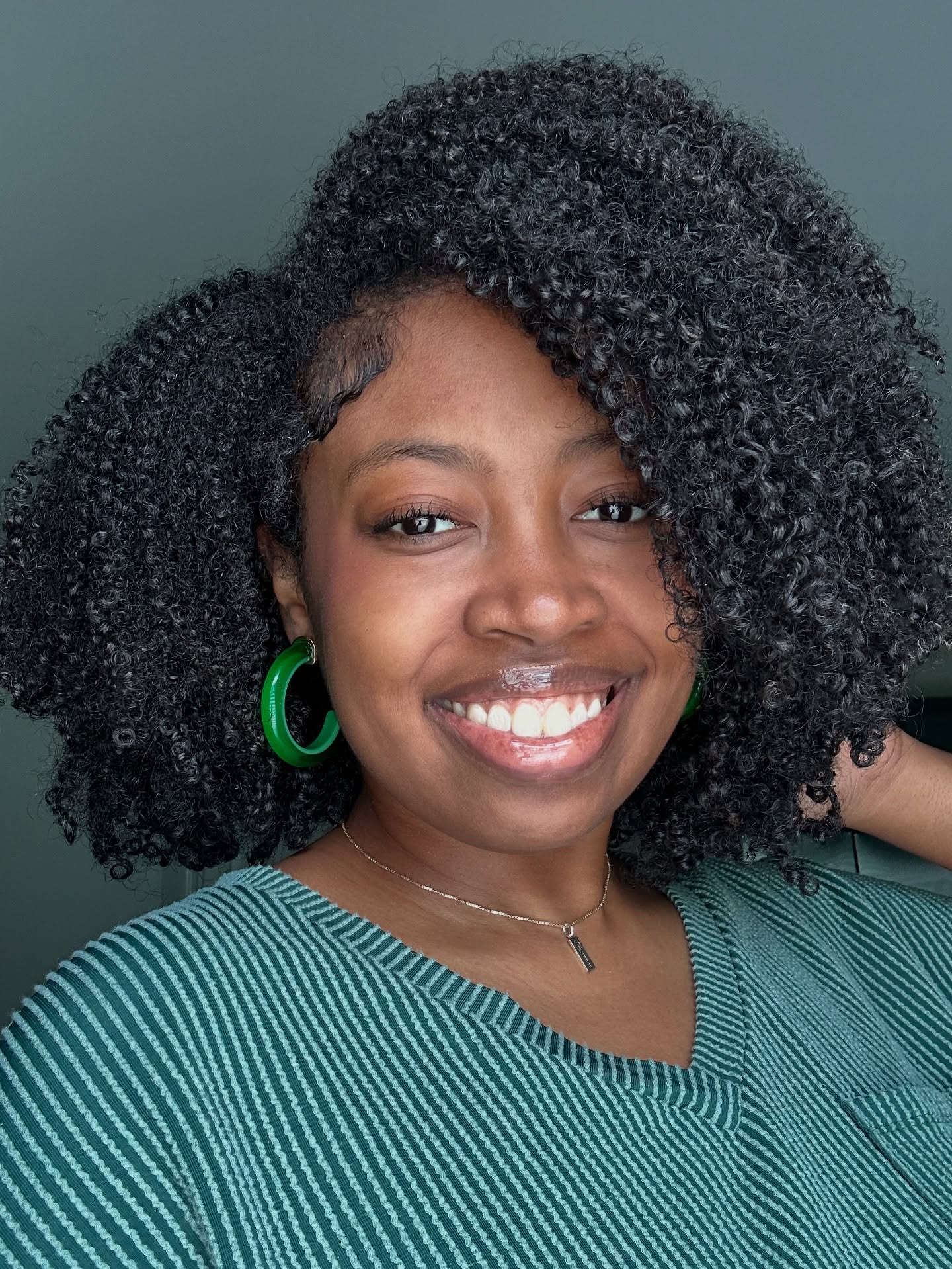 Chic Natural Ebony Volume with Sleek Side Sweep