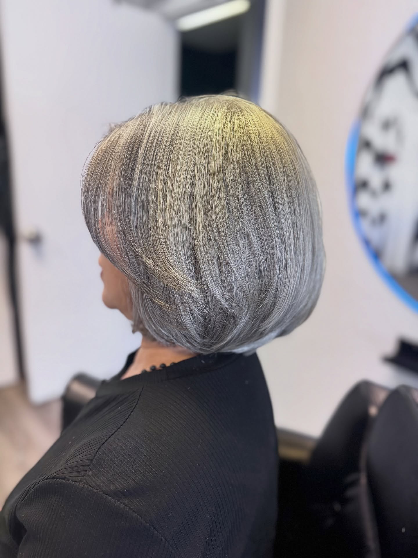 Chic Silver Feathered Bob with Textured Layers