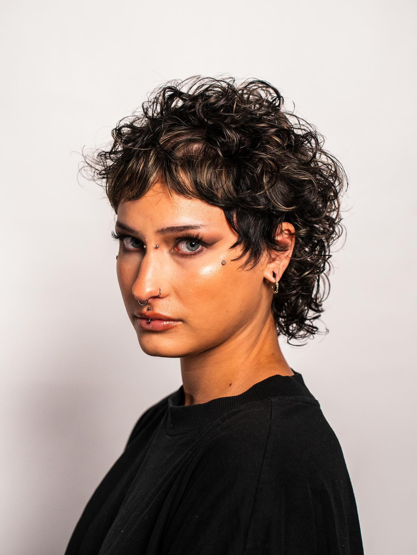 Dynamic Curly Mullet with Edgy Fringe