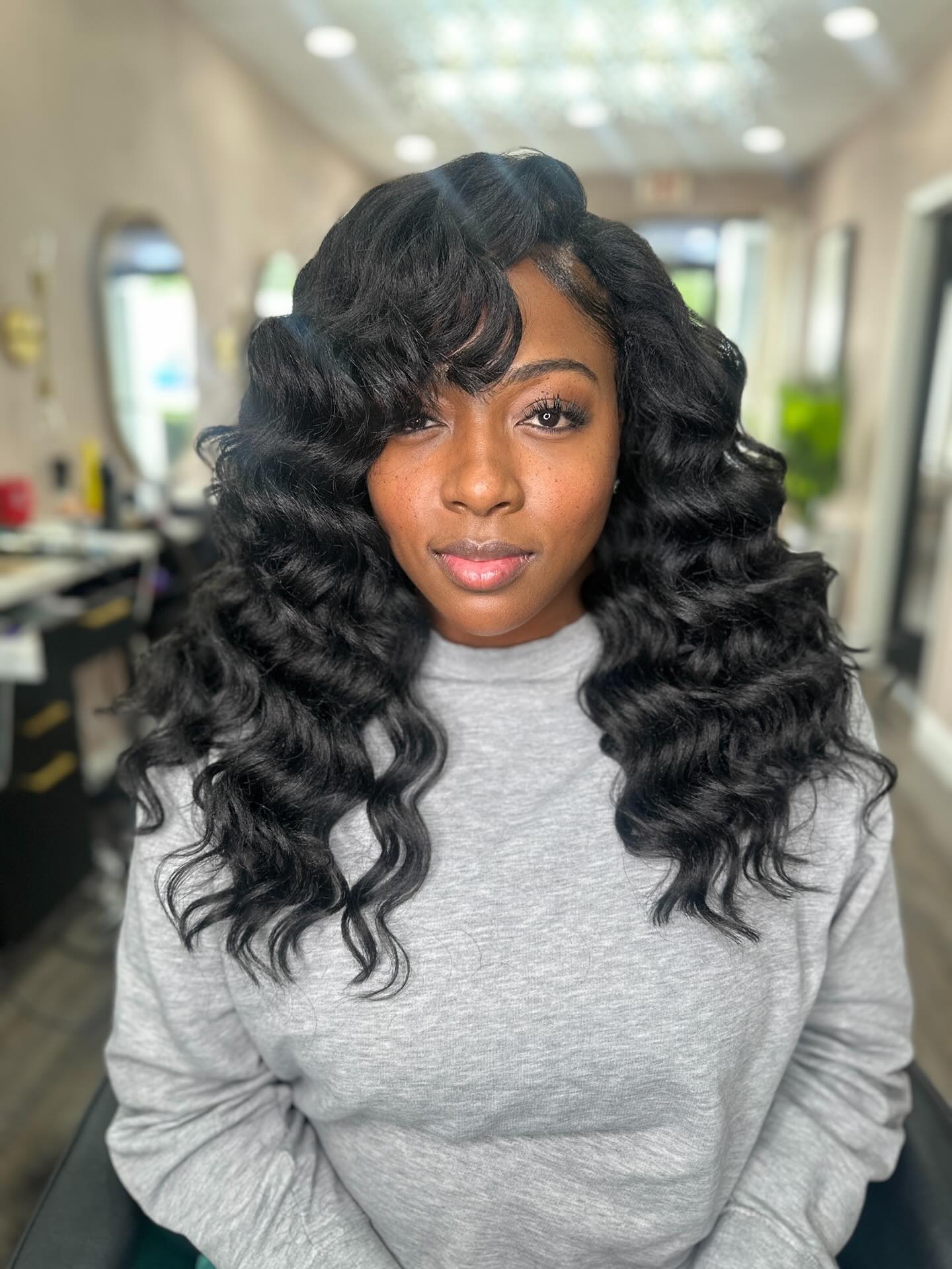 Elegant Black Waves with Soft Fringes