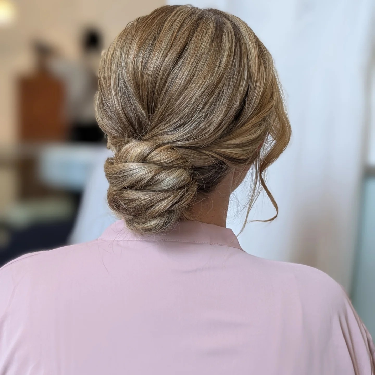 Elegant Twisted Low Bun for Evening Elegance