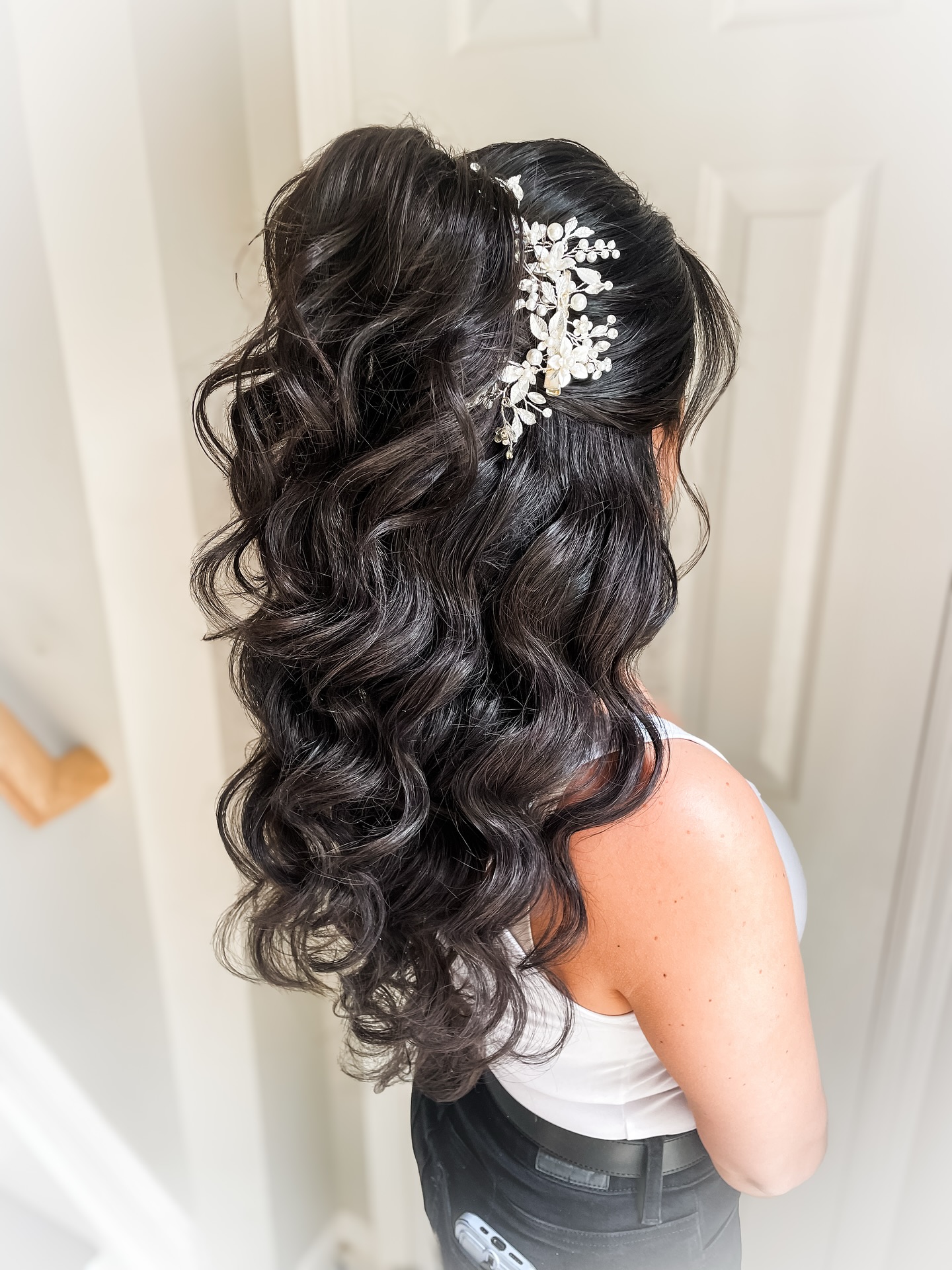 Luxurious Ebony Waves with Silver Floral Accent