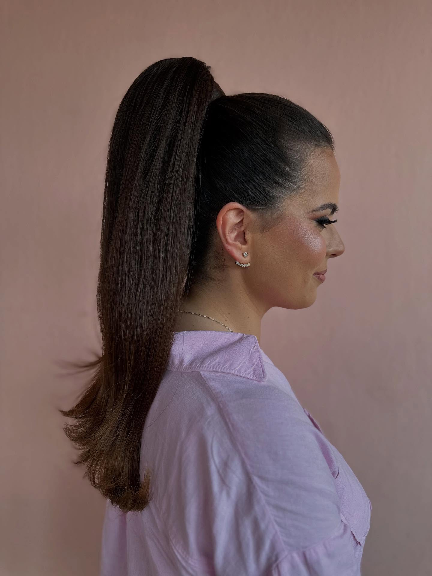 Polished Long Ponytail with Subtle Waves