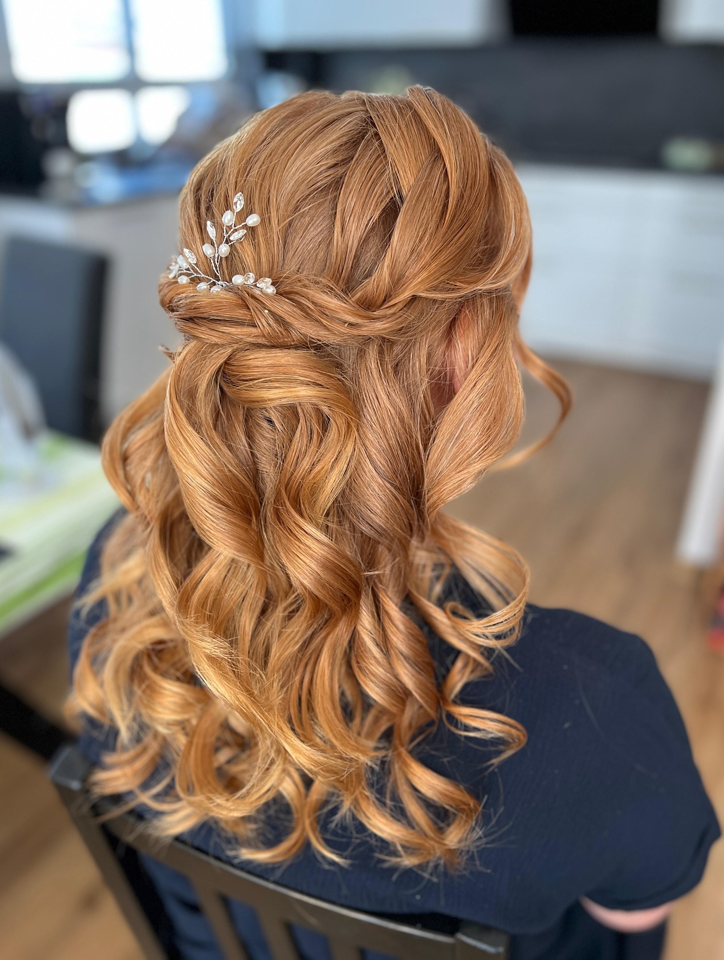 Refined Copper Swirls Half-Up Hairstyle with Crystal Pin Accent