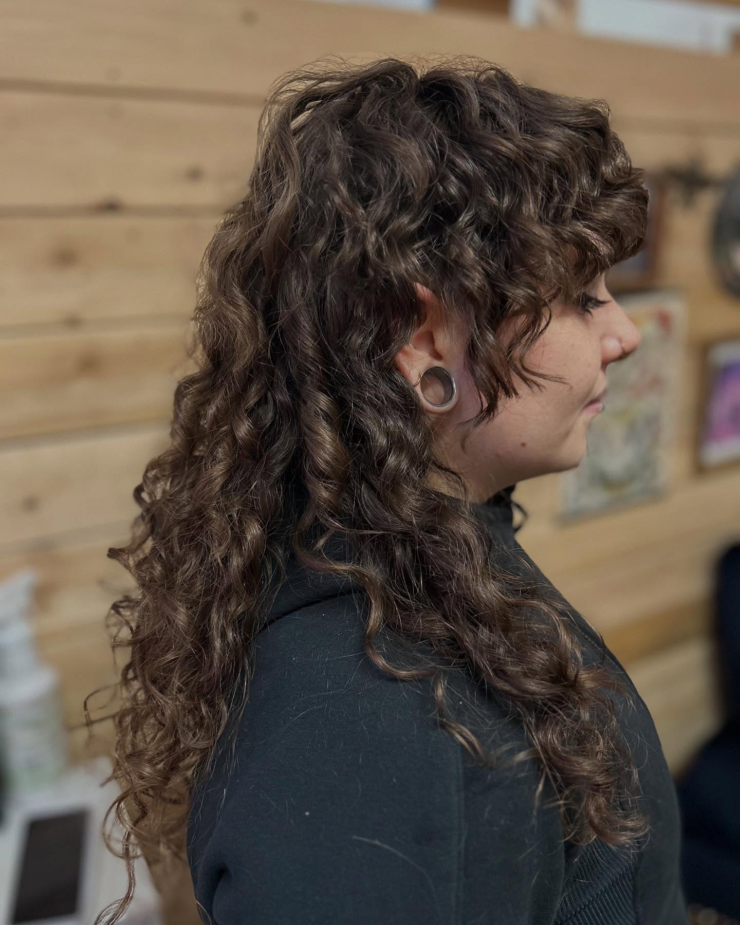 Voluminous Curly Mullet with Tapered Layers