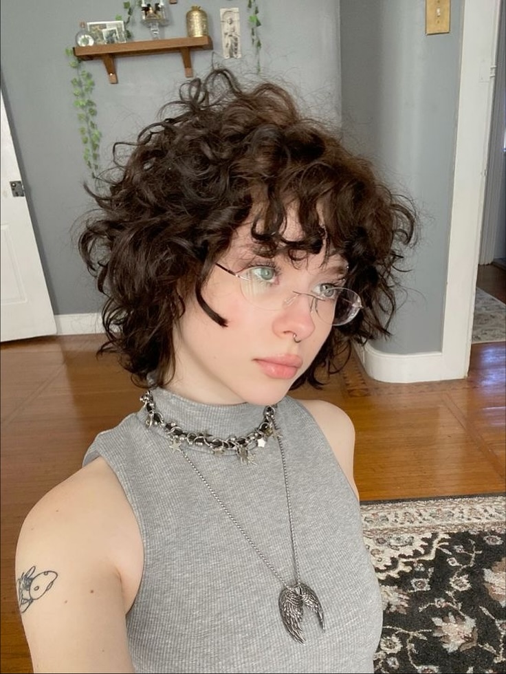 Chic Voluminous Short Curls with Tousled Texture