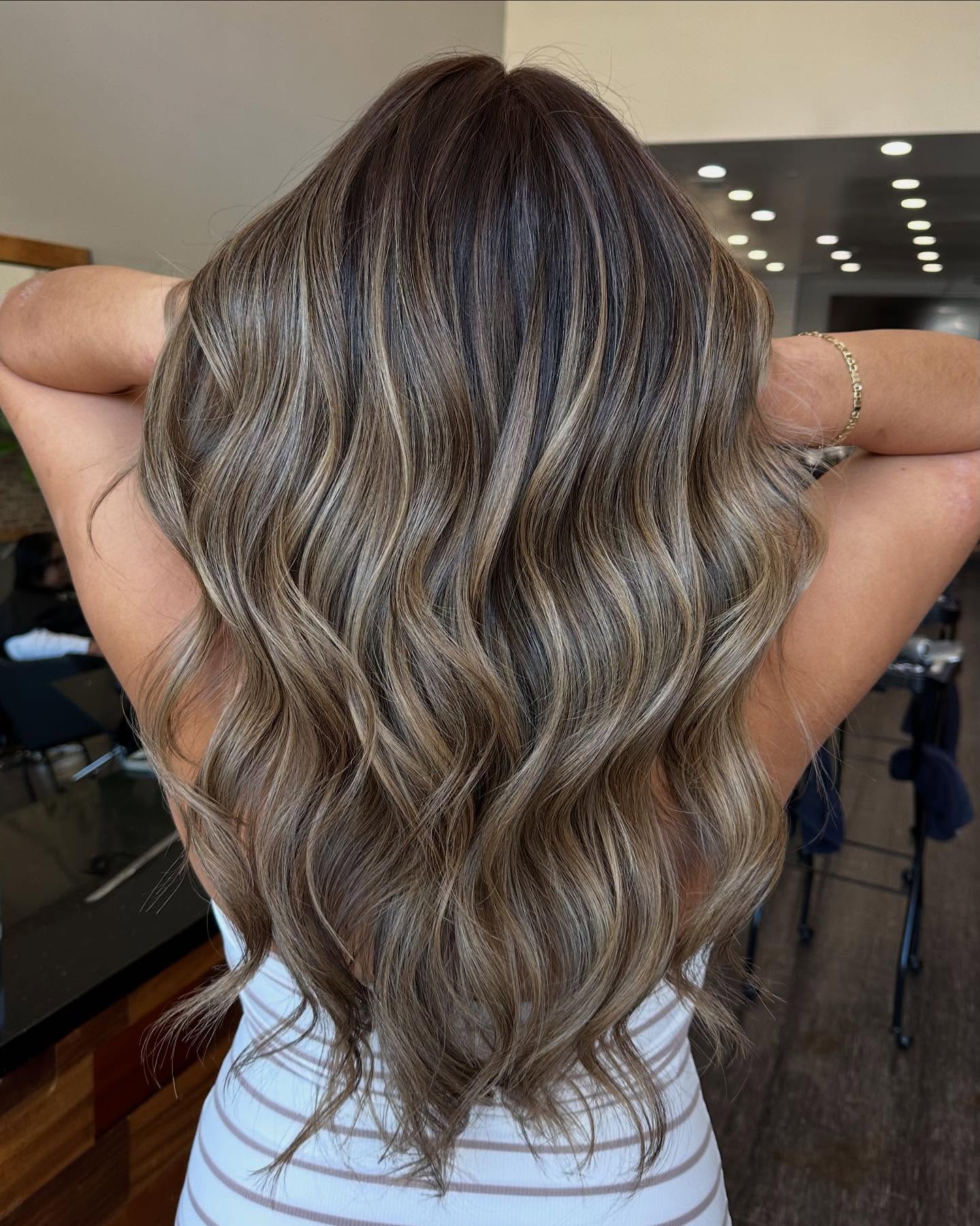 Dimensional Ash Blonde Waves with Mixed Highlights