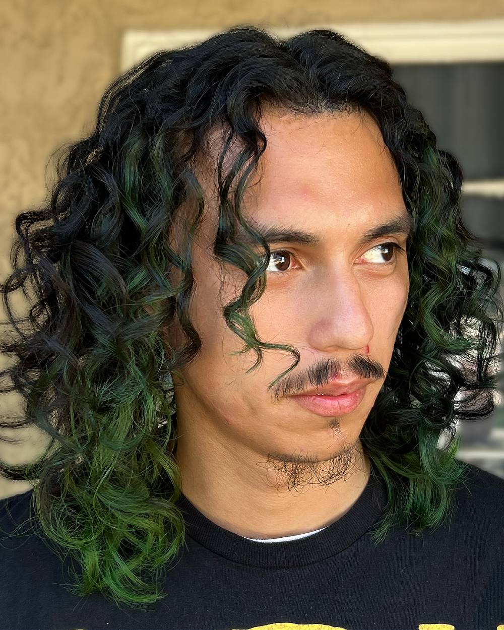 Dynamic Long Curly Hair with Vibrant Green Tips