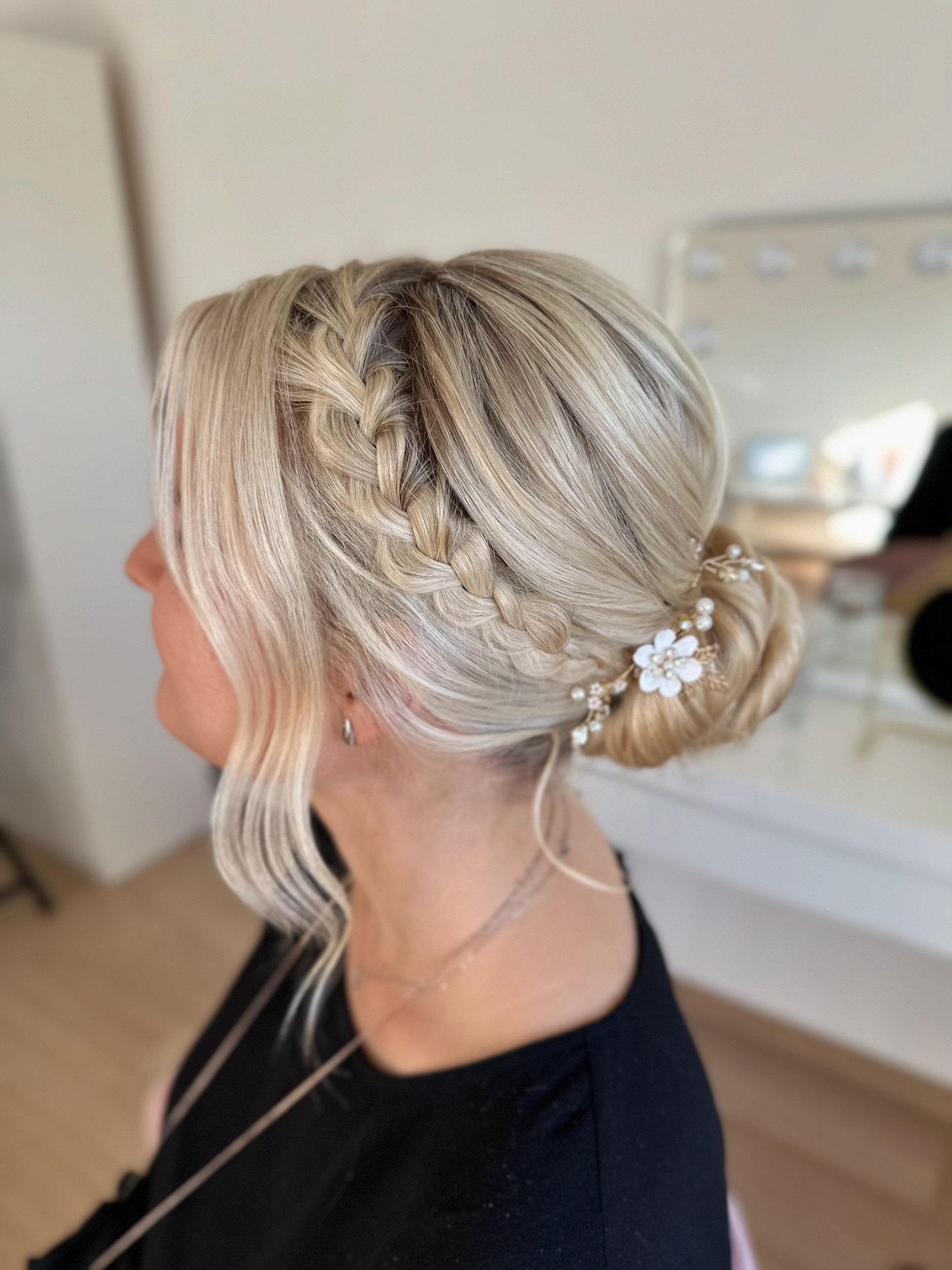 Elegant Braided Crown with Floral Accents