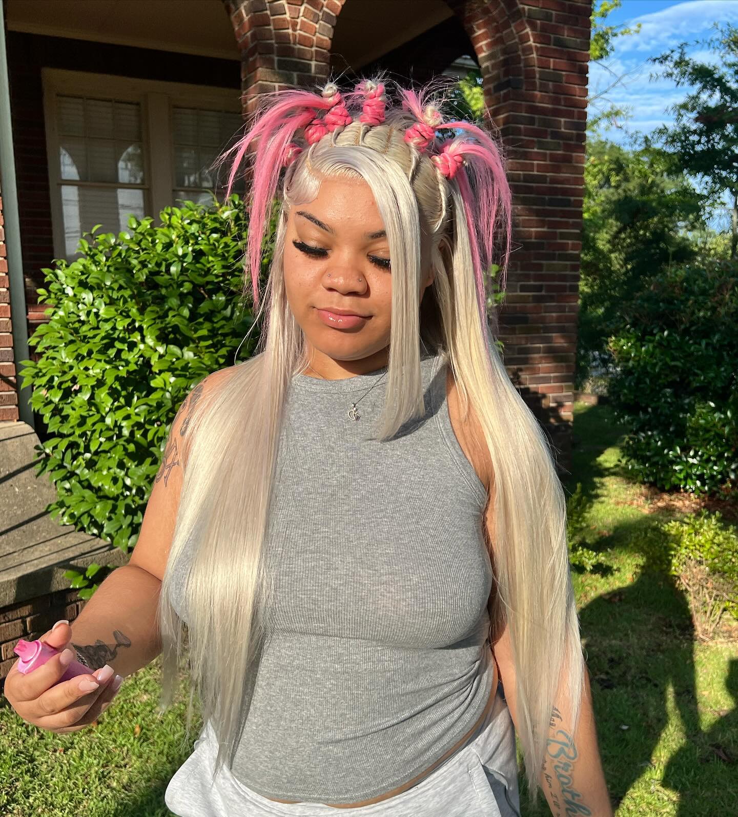 Playful Pink Accents on Silky Straight Locks