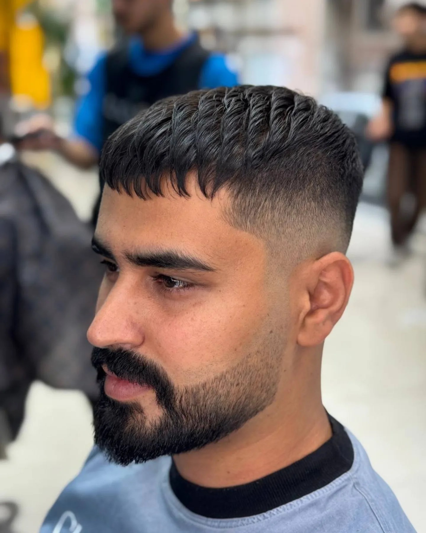 Sculpted French Crop with Detailed Fringe and Fade