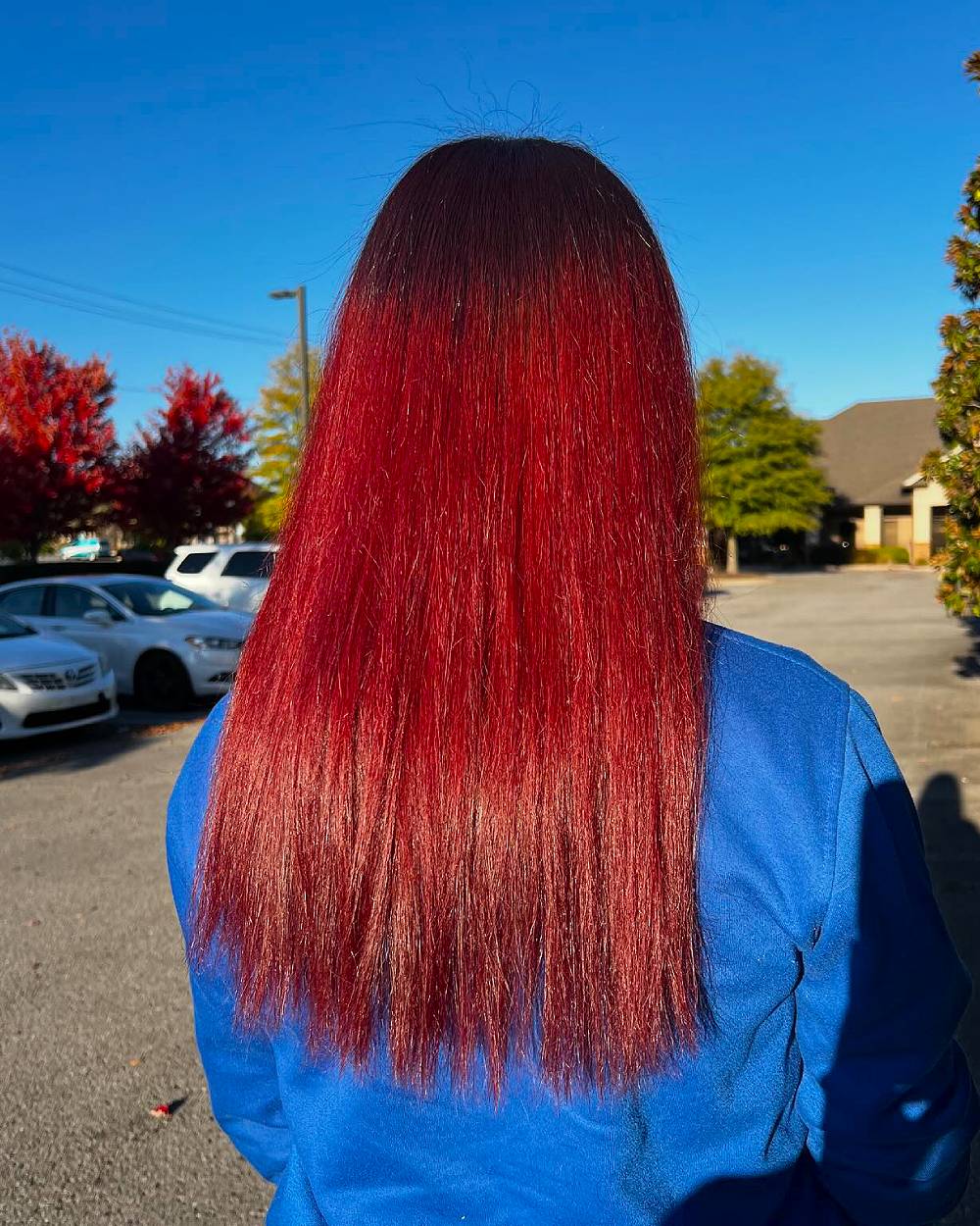 Bold Crimson Sleek Straight Hair with Glossy Finish