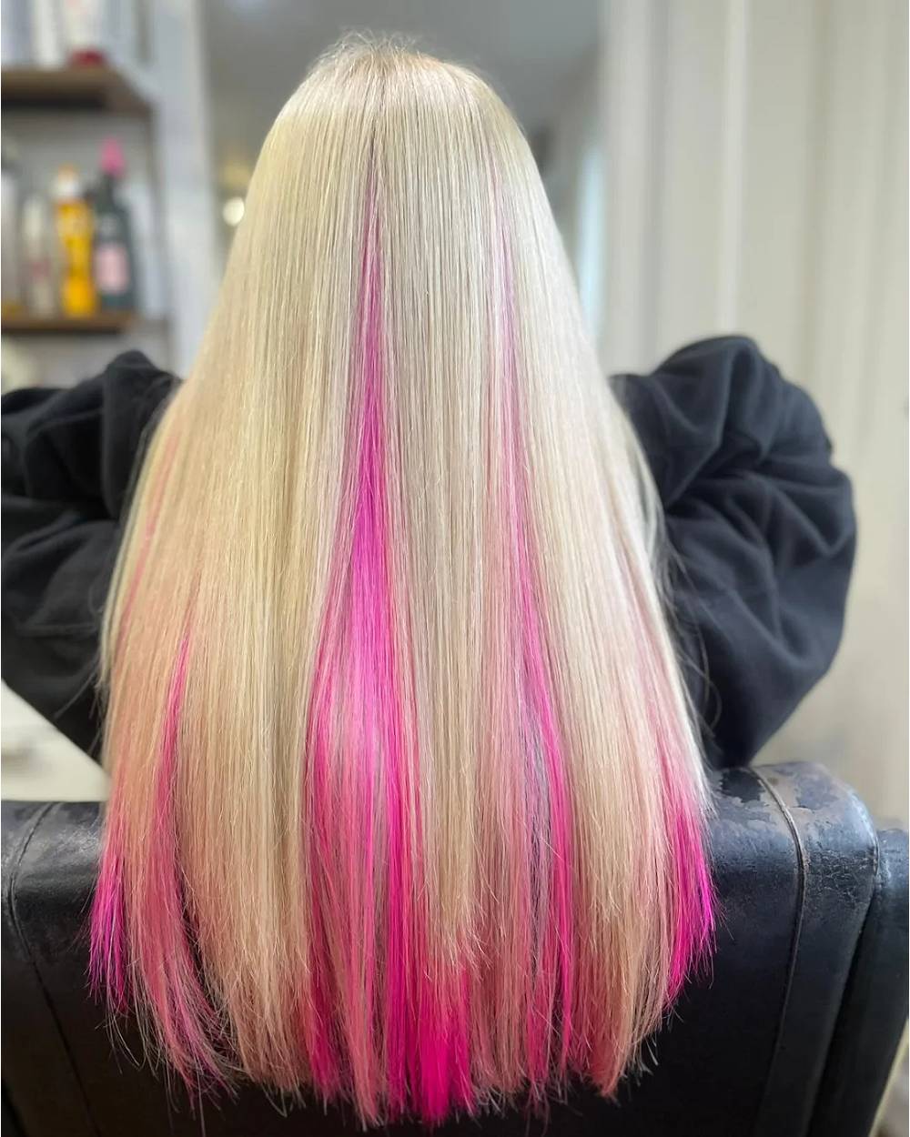Bold Pink Streaked Straight Hair