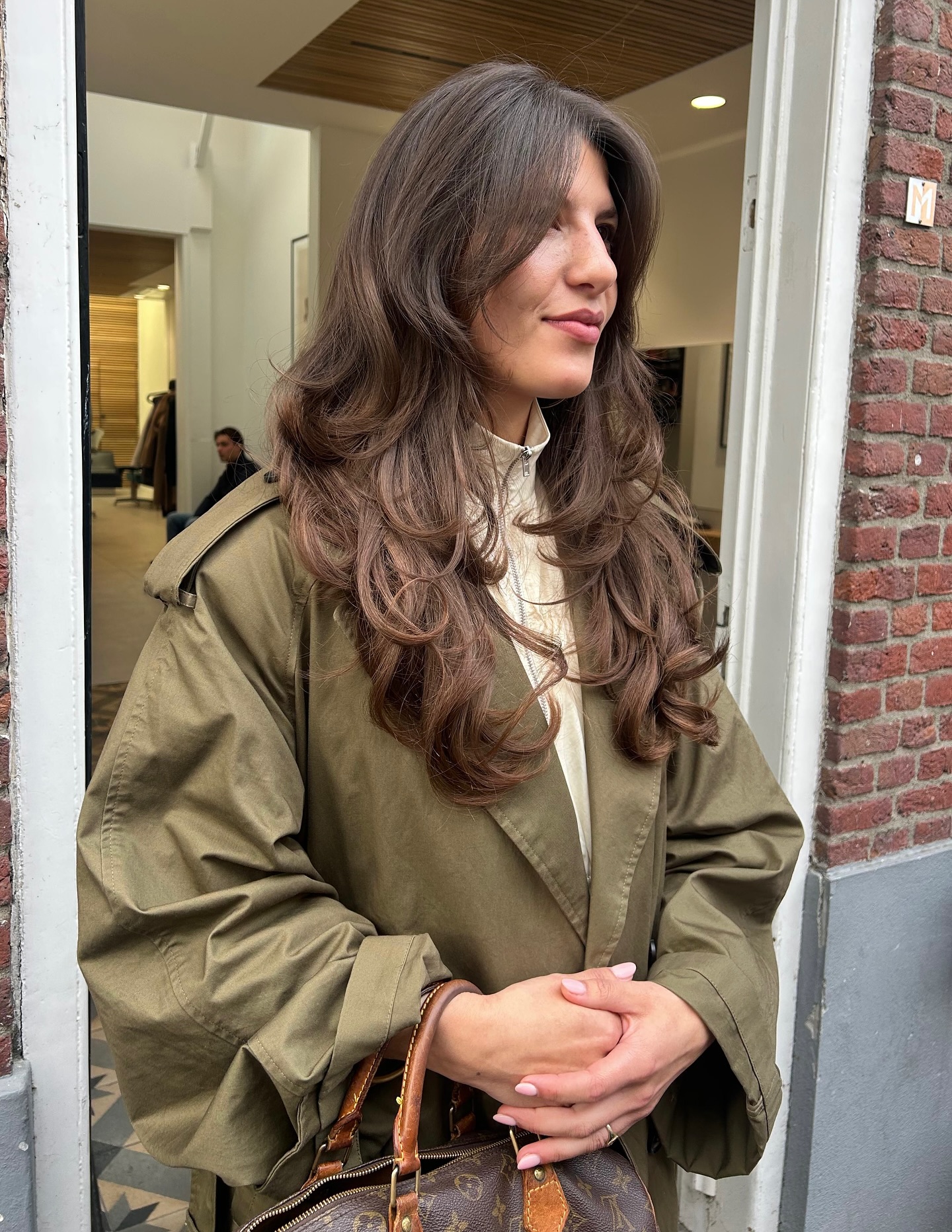 Flowing Brunette Layers with Subtle Highlights