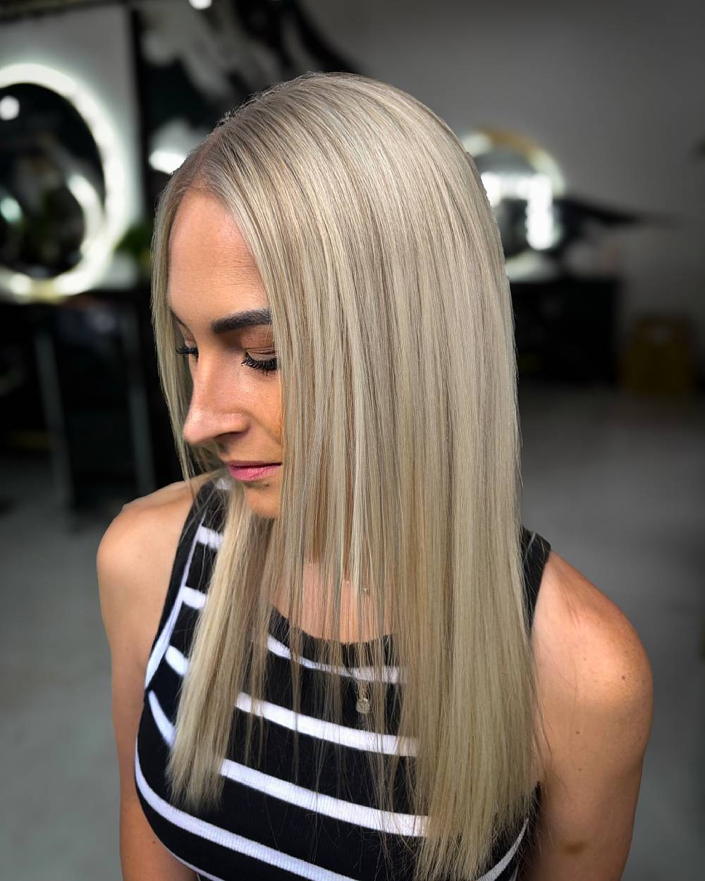 Glossy Straight Hair with Cool Platinum Highlights