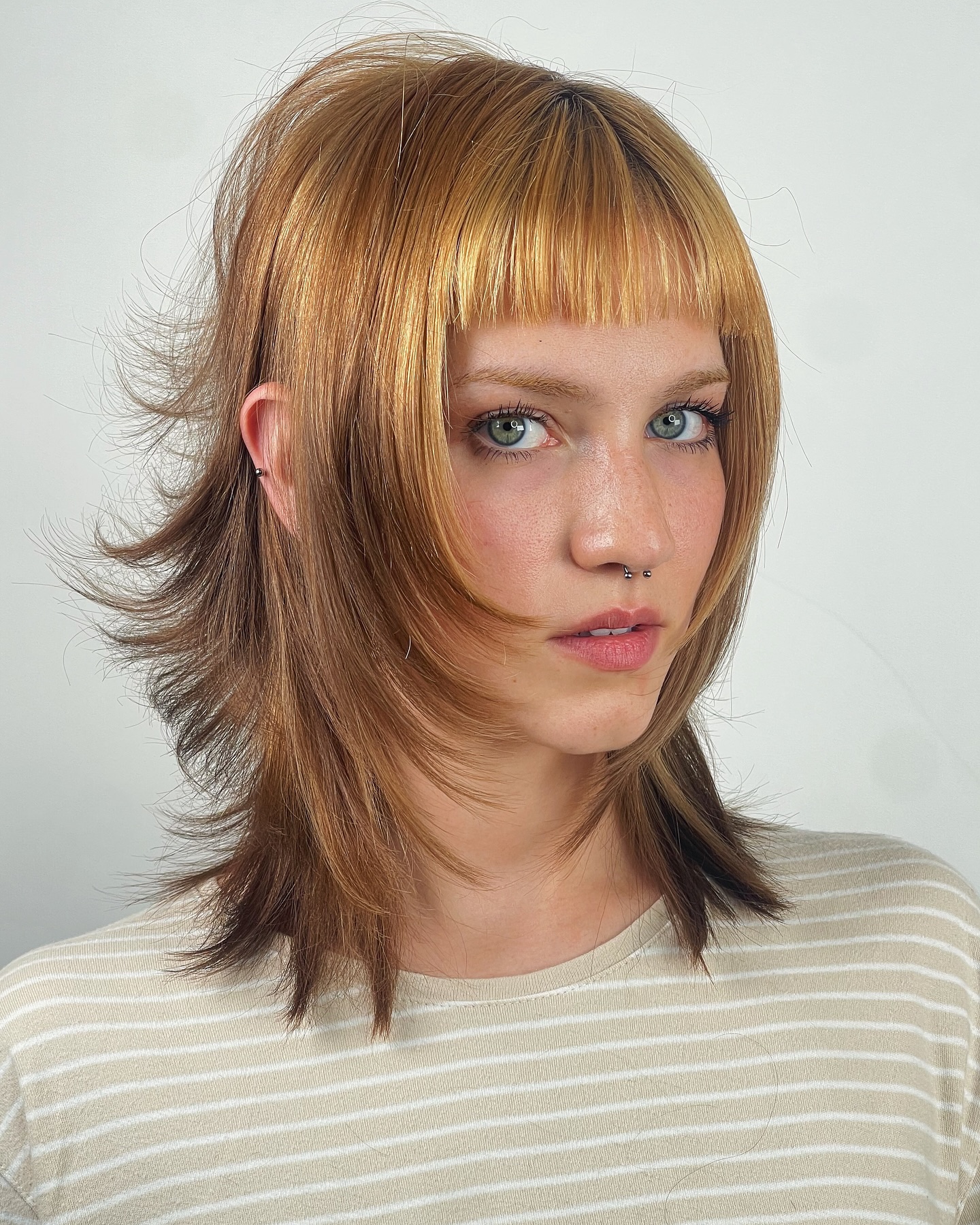 Golden-Toned Bob with Textured Bangs
