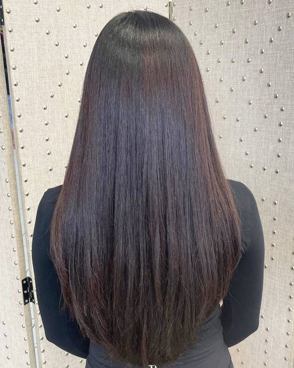 Sleek Long Straight Hair with Subtle Dark Undertones