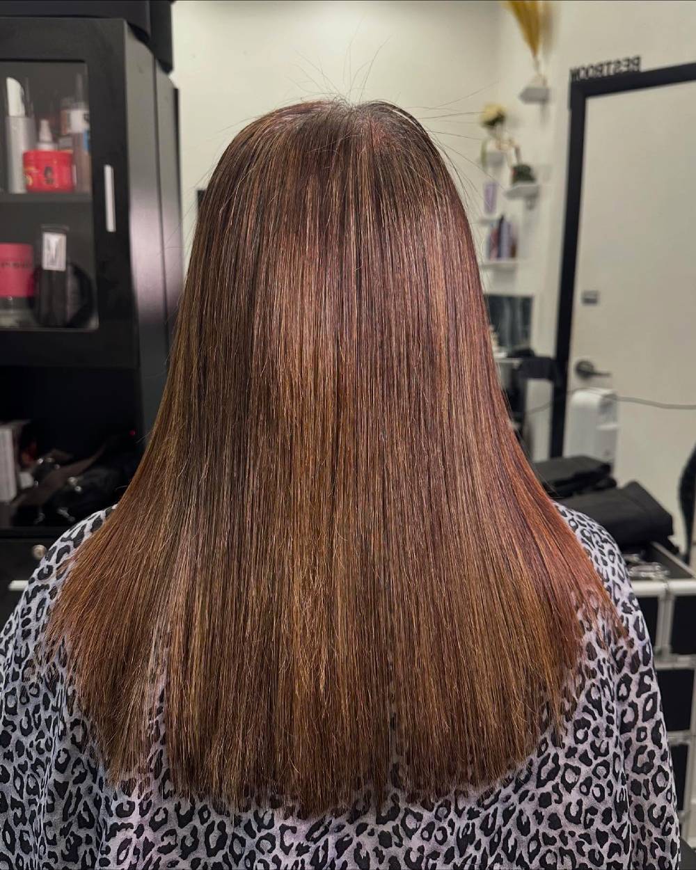 Sleek Straight Hair with Subtle Warm Undertones