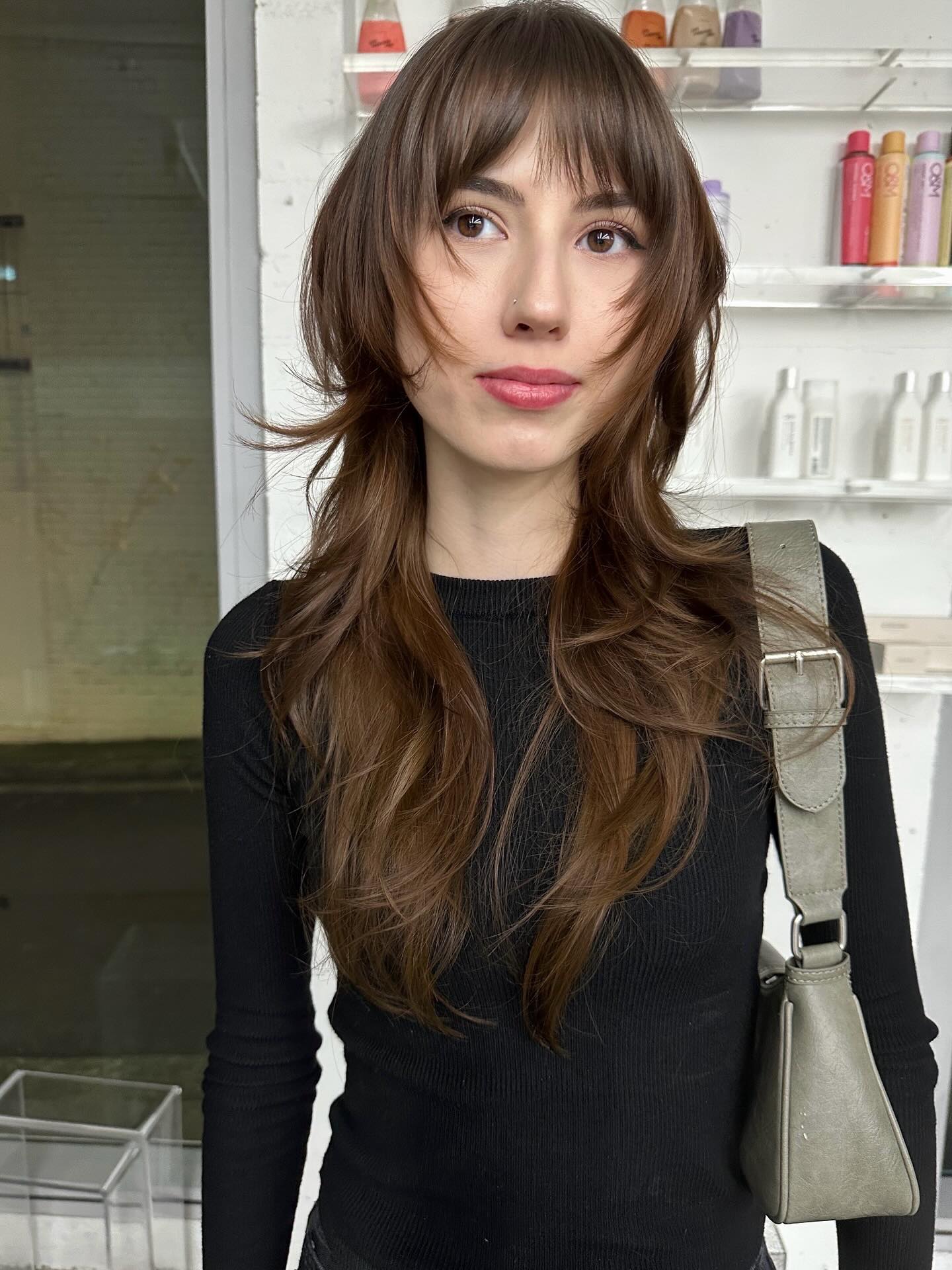 Soft Chestnut Waves with Curtain Bangs