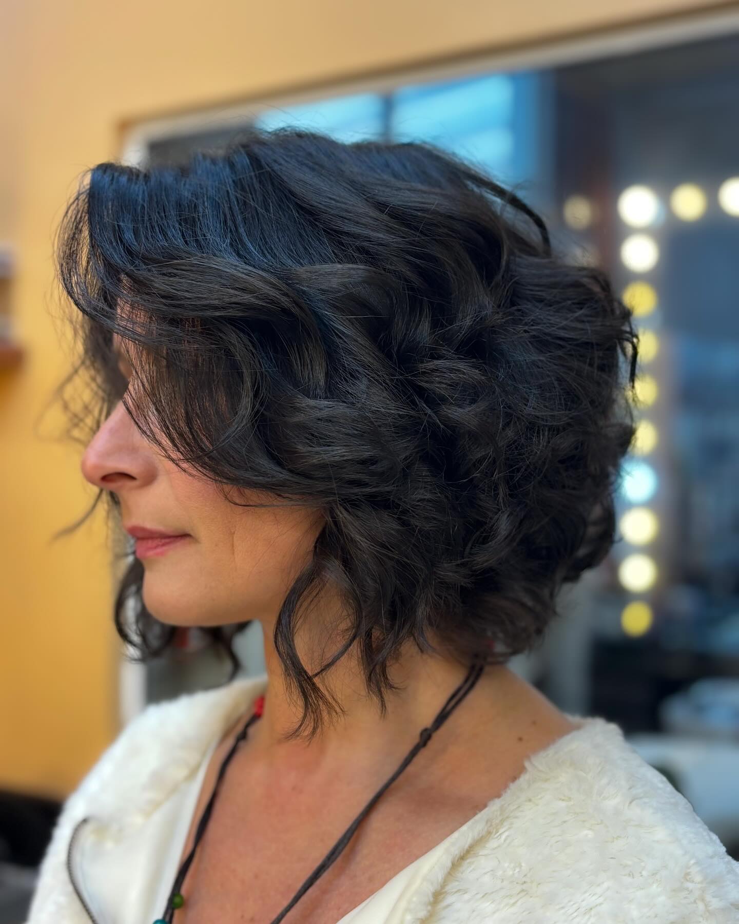 Textured Curly Bob with Subtle Highlights