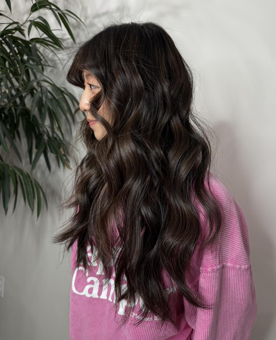 Deep Brunette Tousled Layers with Soft Bangs