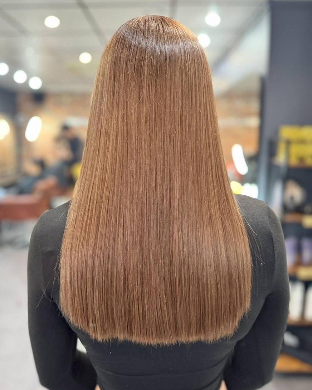 Glossy Straight Hair with Subtle Warm Undertones