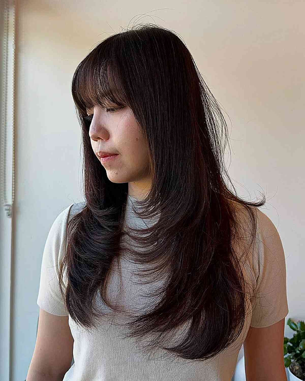 Long Layered Haircut with Bangs