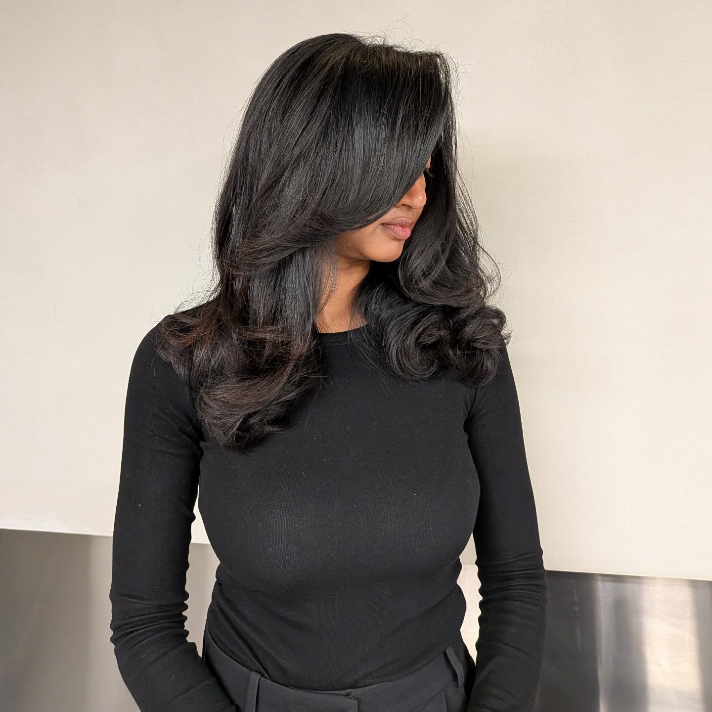 Sleek Charcoal Waves with a Hint of Glamour
