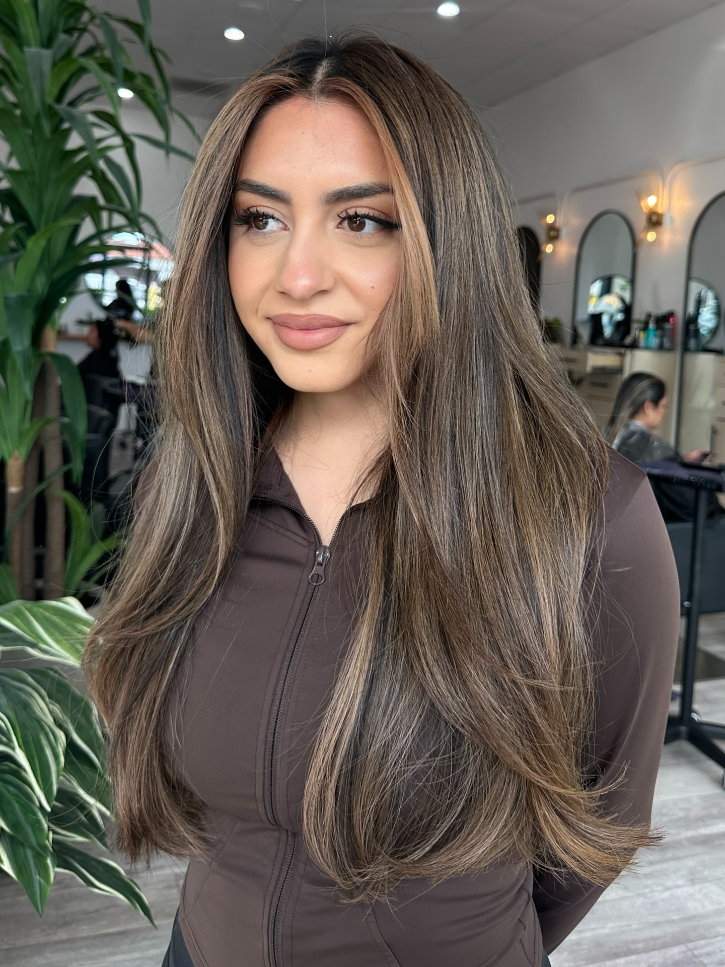 Sleek Mid-Length Layered Cut with Soft Balayage
