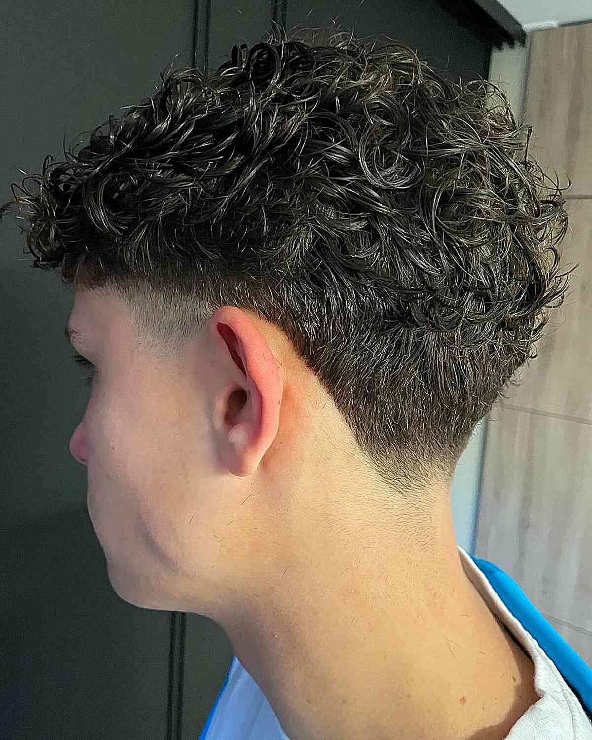 Stylish Low Taper Fade with Curly Texture
