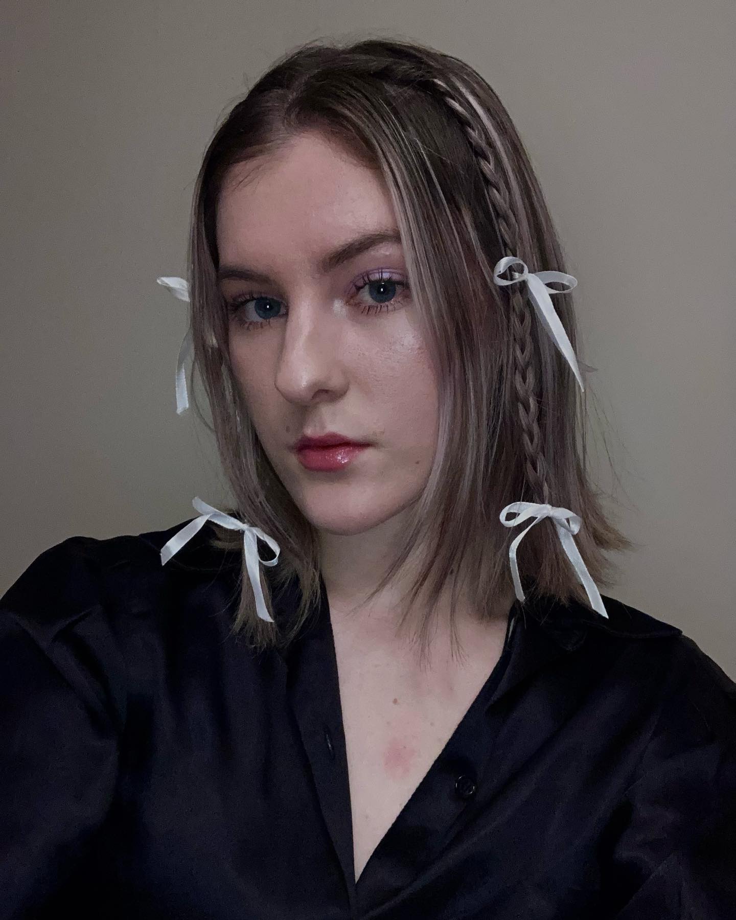 Chic Blonde Bob with Ribbon-Tied Braids