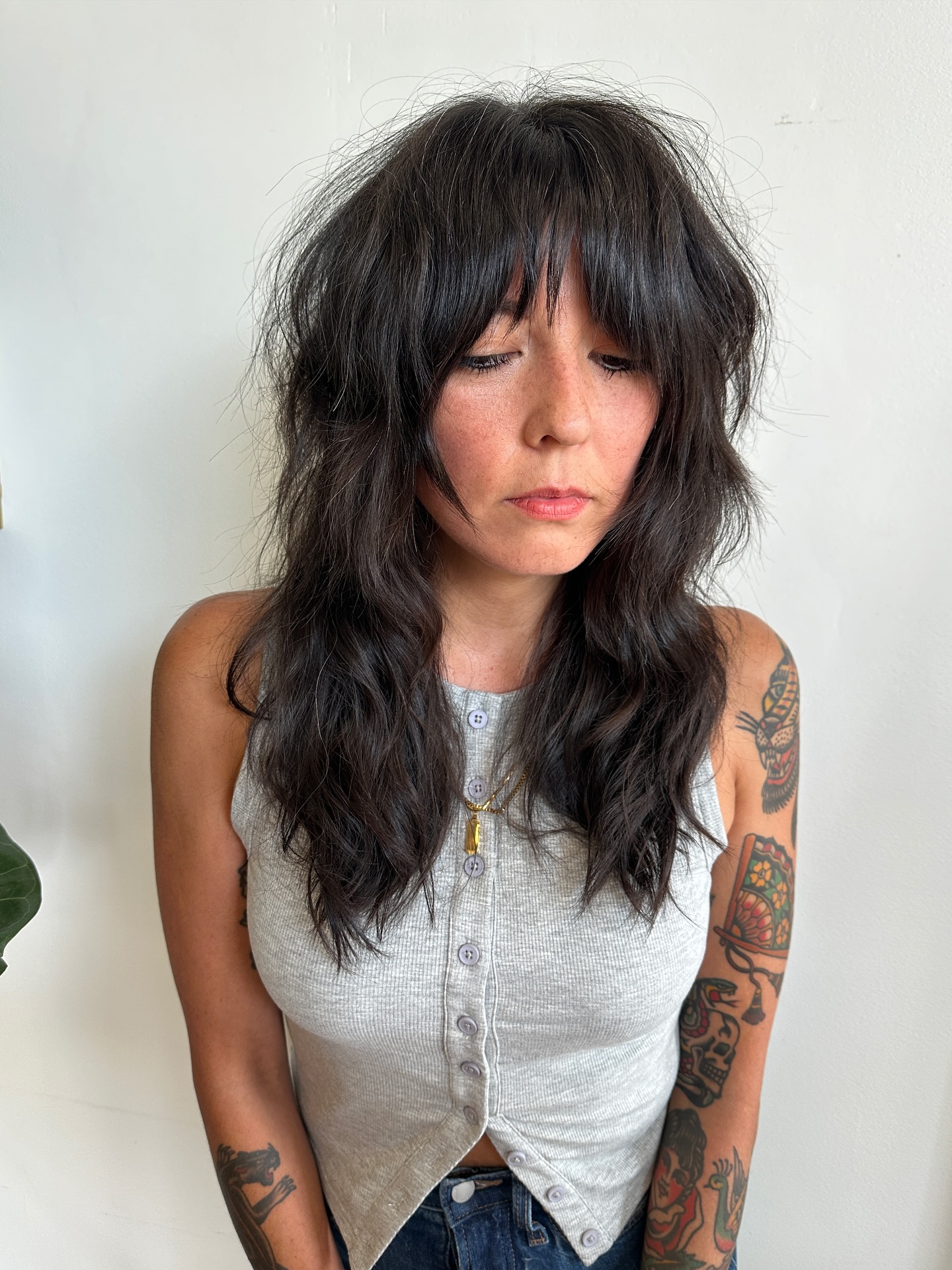 Chic Dark Wavy Layers with Wispy Fringe