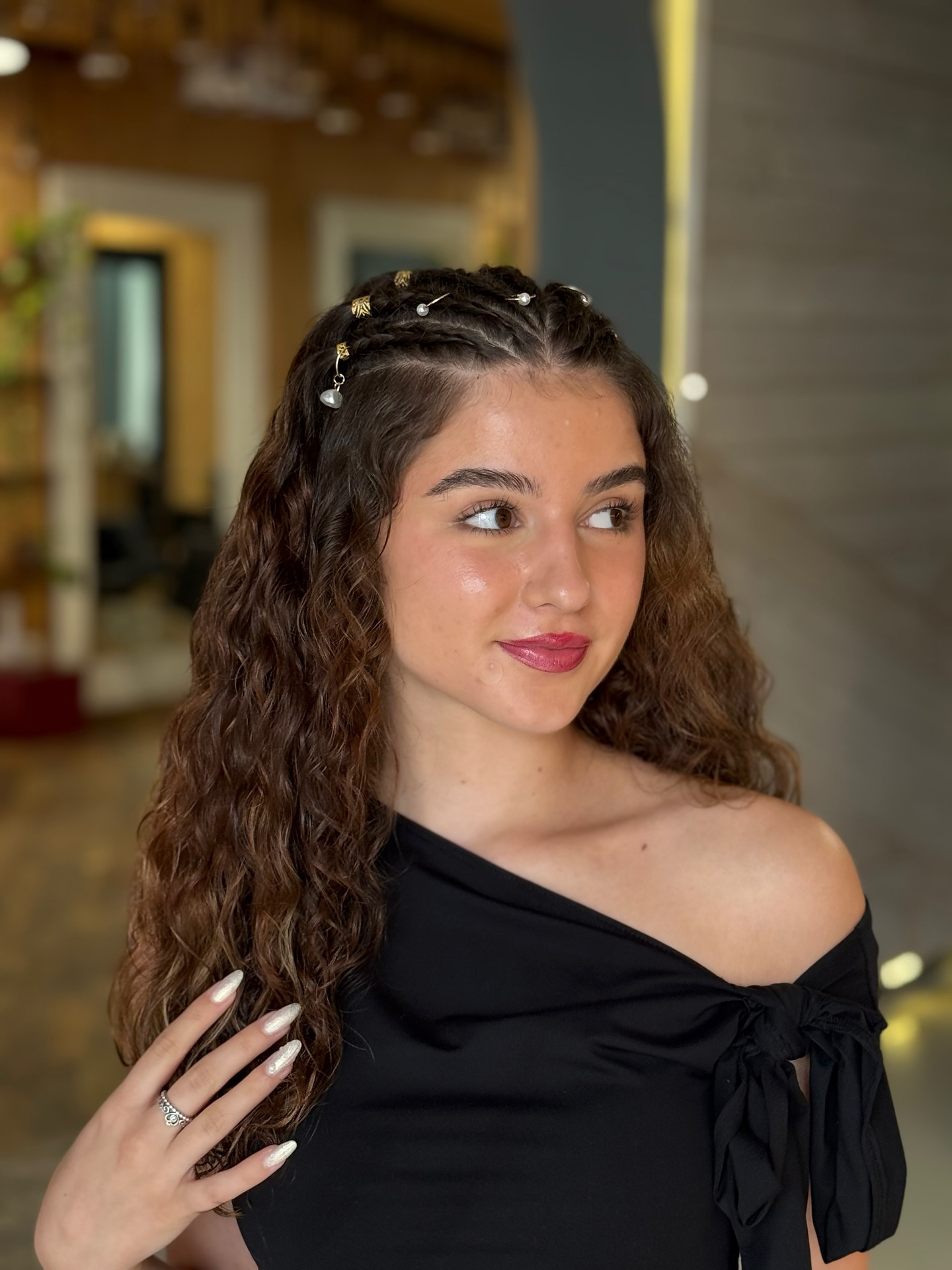 Chic Embellished Cornrow Accents on Natural Curls