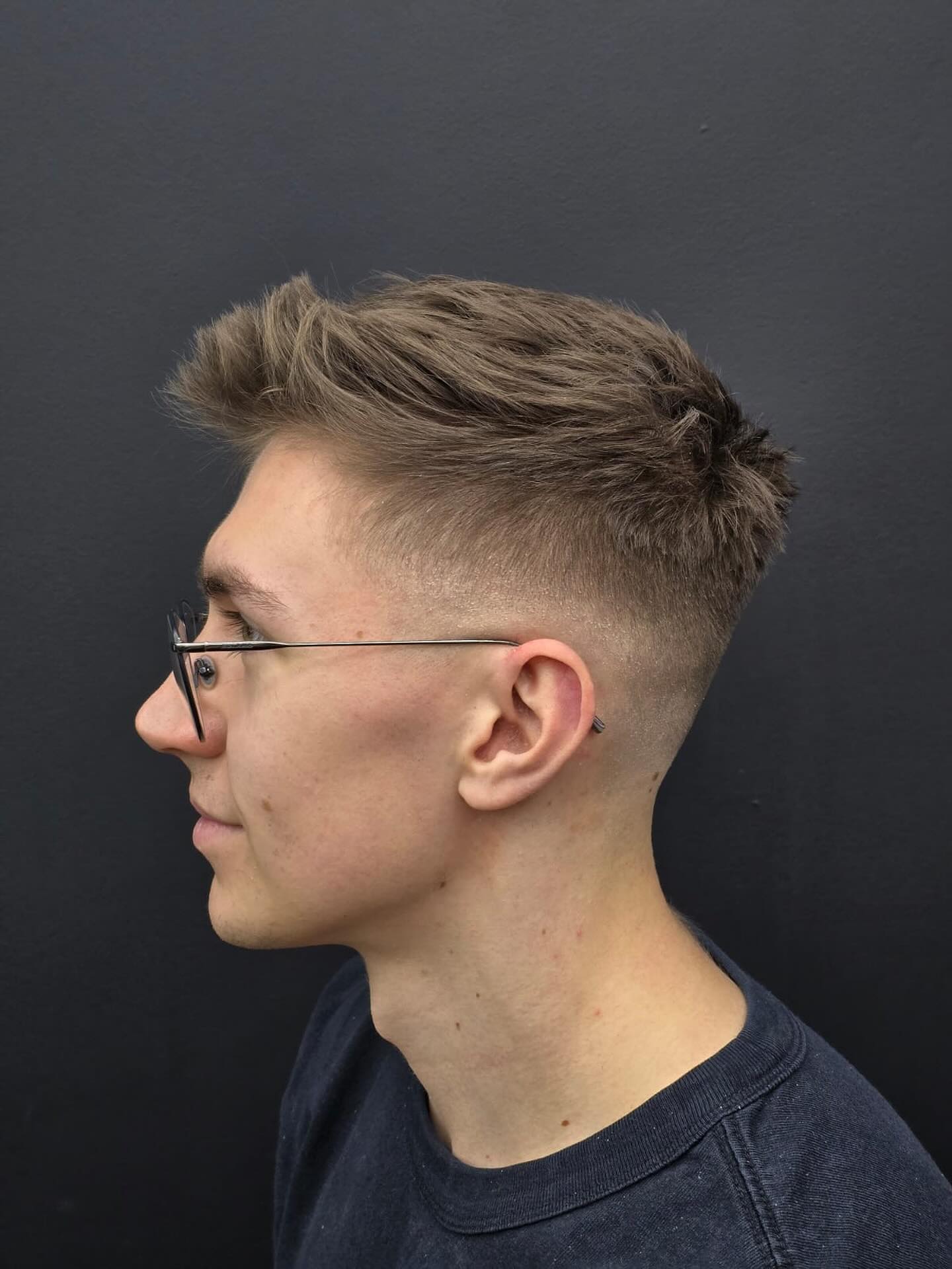 Dynamic Tousled Quiff with Disconnected Undercut