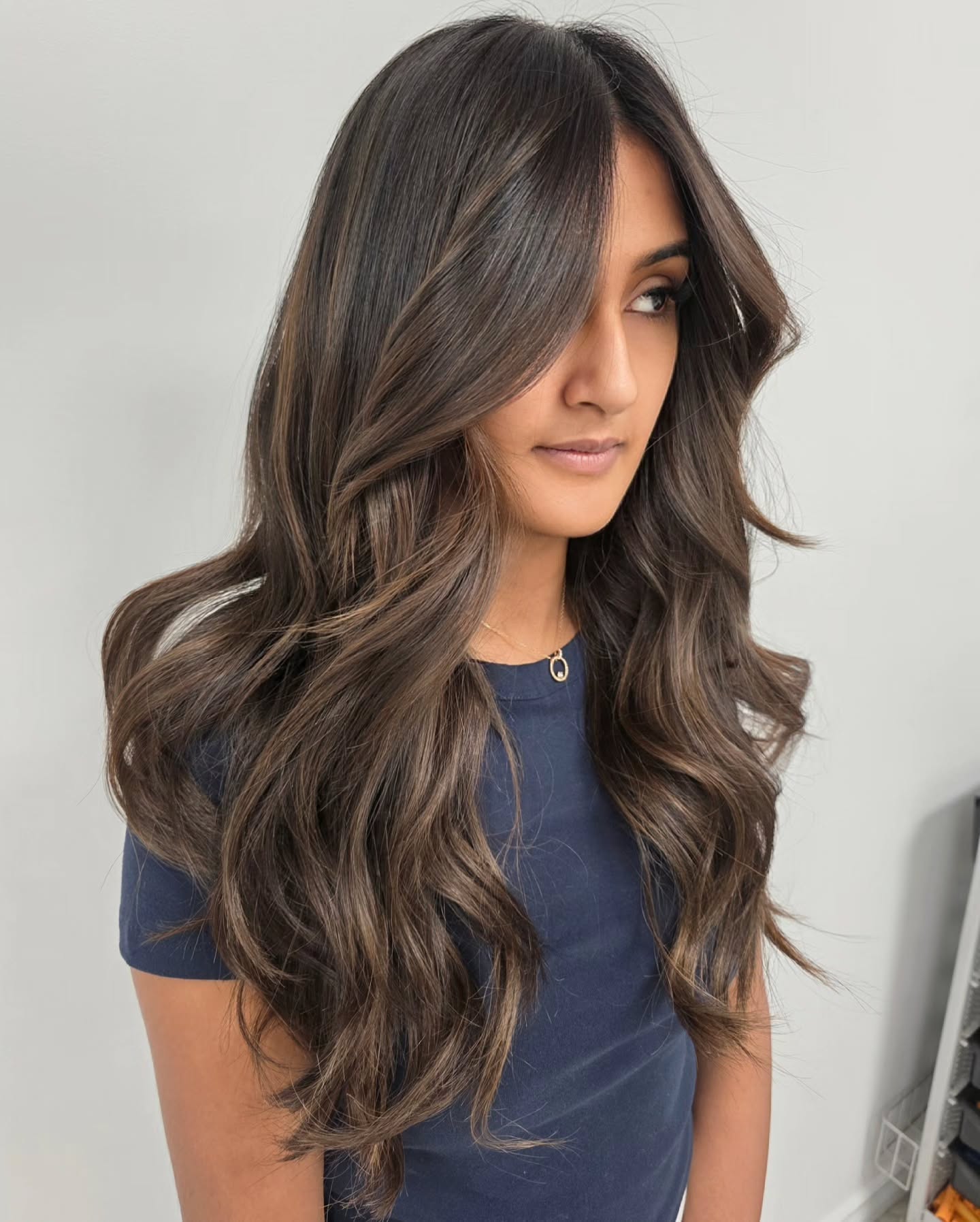 Elegant Brunette Cascade with Soft Waves