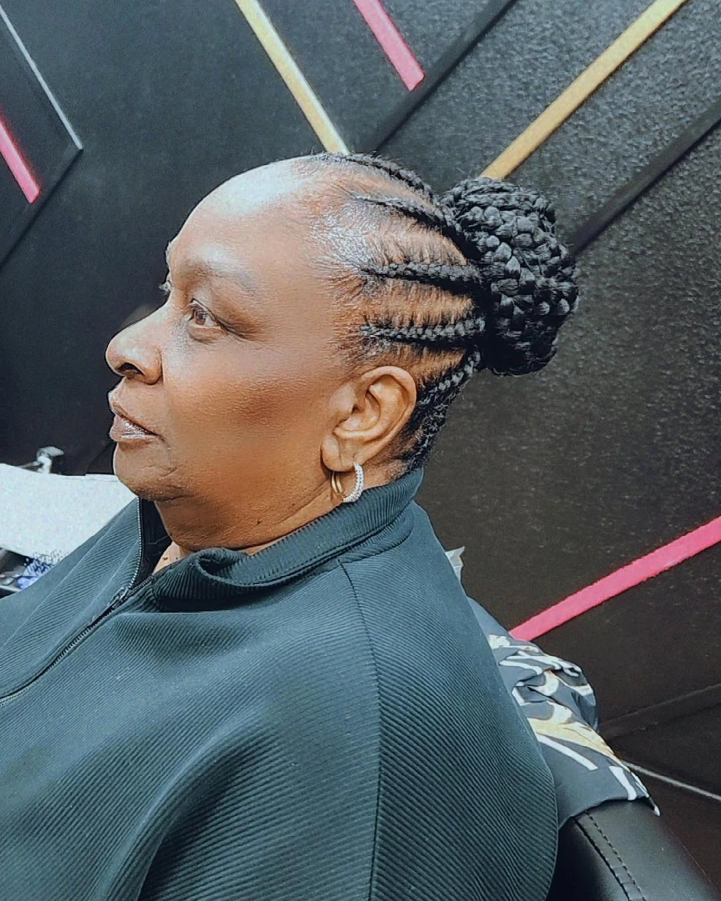 Elegant Cornrow Bun with Sculpted Baby Hairs