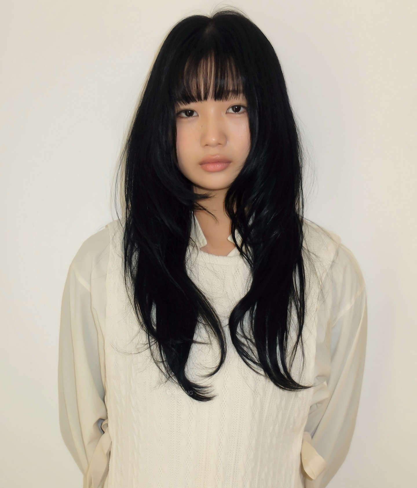 Flowing Midnight Layers with Feathered Bangs