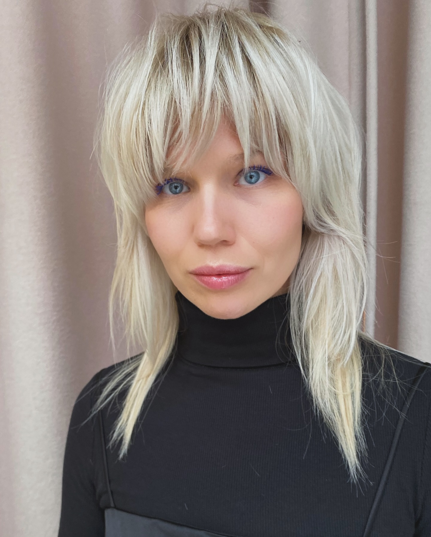 Light Blonde Shag Wolfcut with Bold Textured Layers