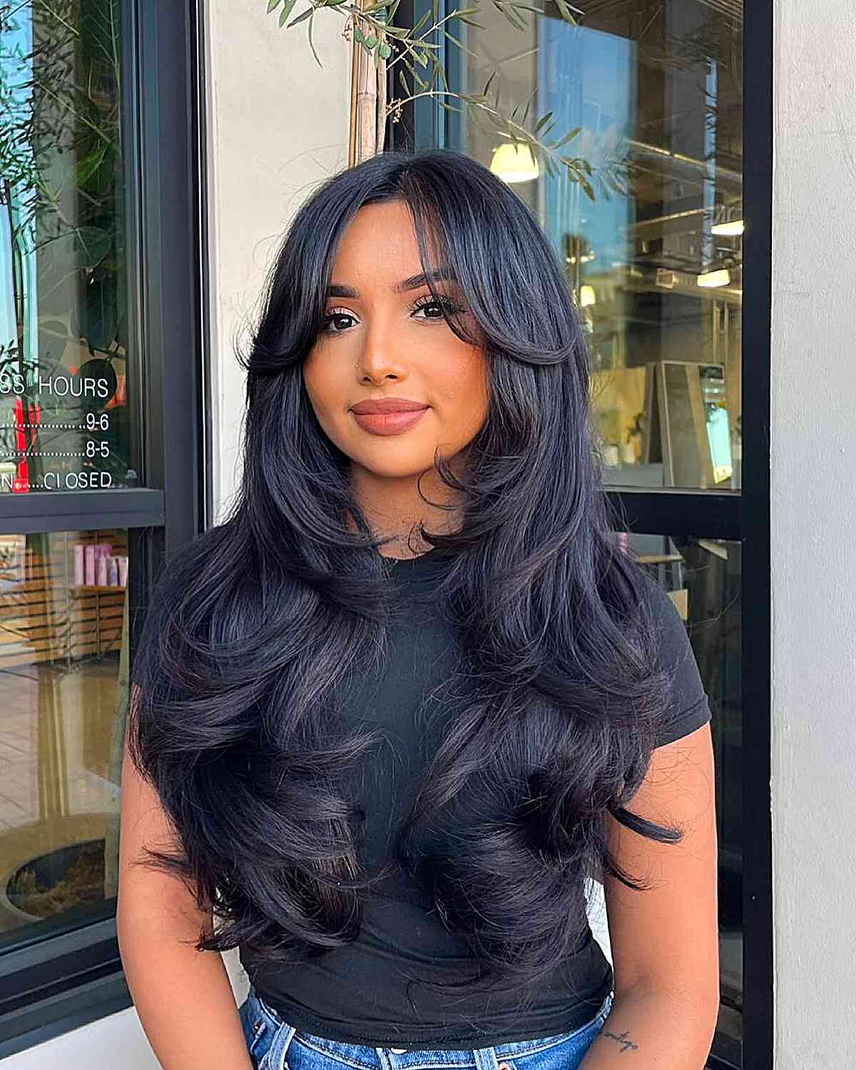 Long Hair with Curtain Bangs and Soft Layers