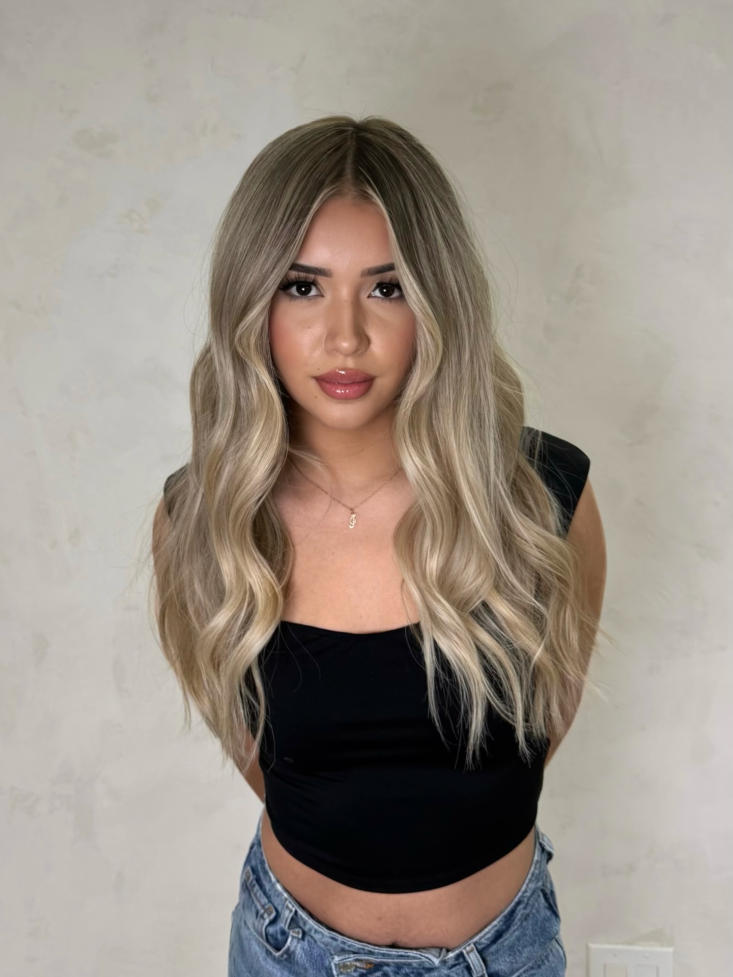 Luxurious Ash Blonde Waves with Seamless Balayage