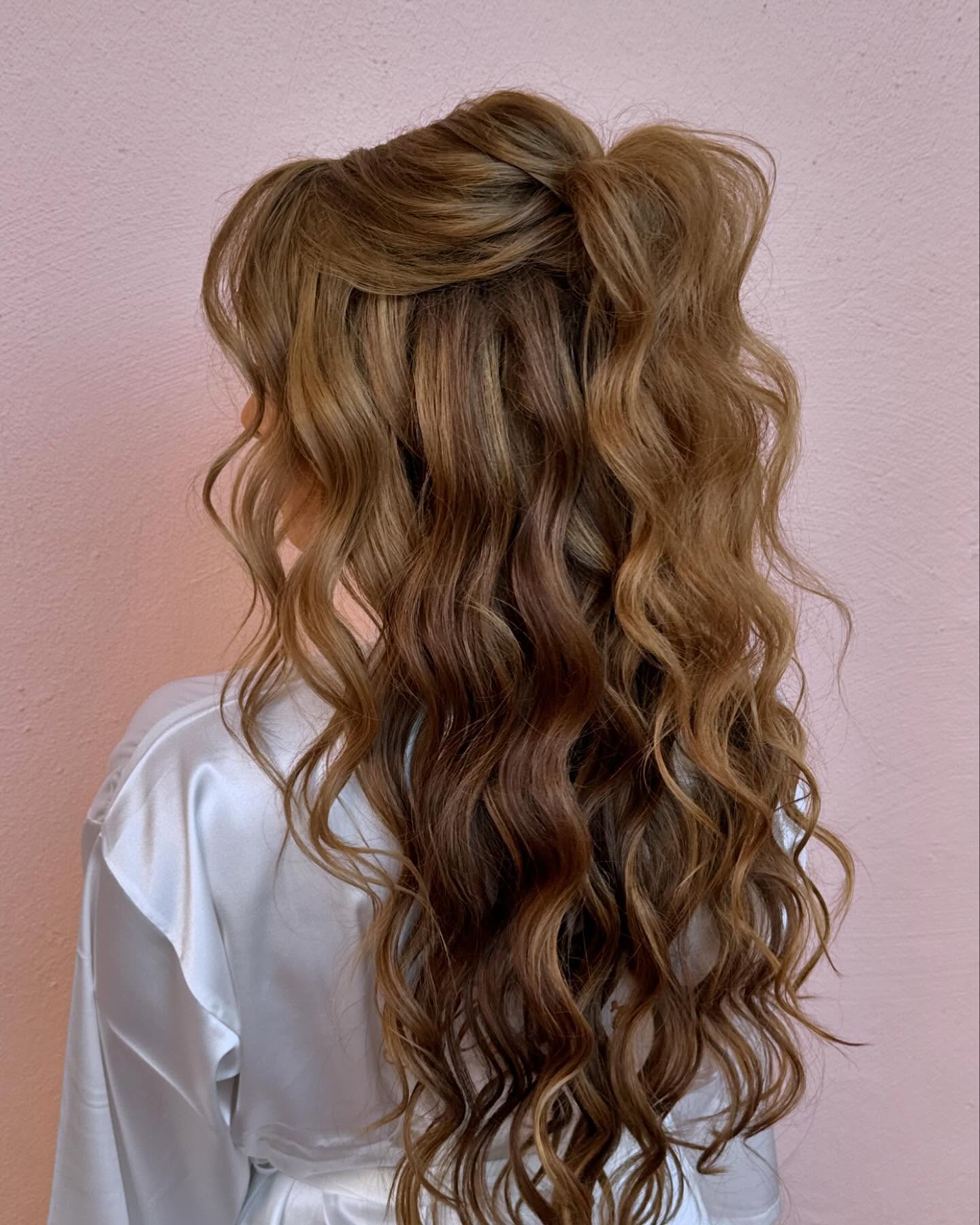 Luxurious Cascading Curls with Voluminous Half-Up Twist