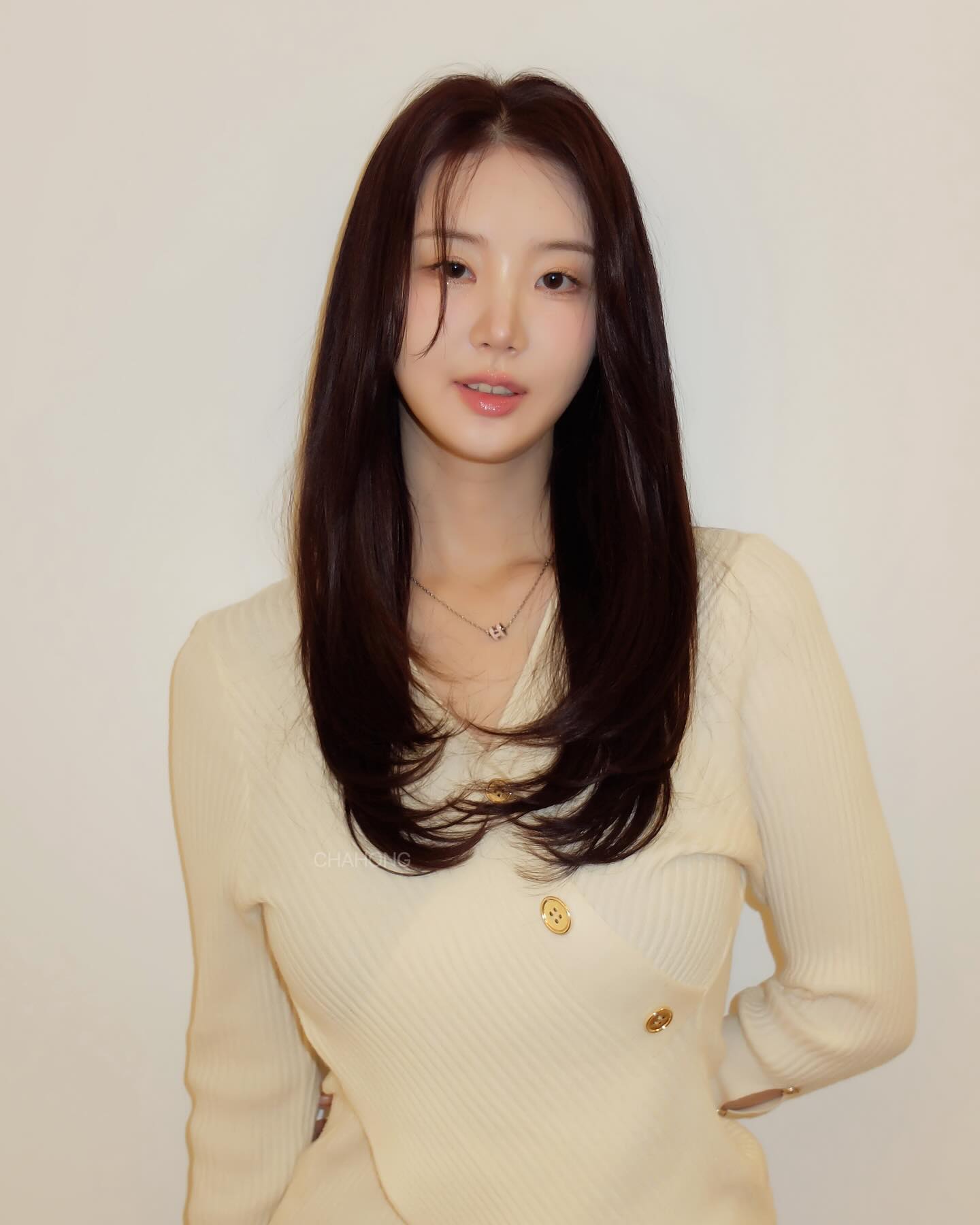 Luxurious Long Layers with Subtle Curls