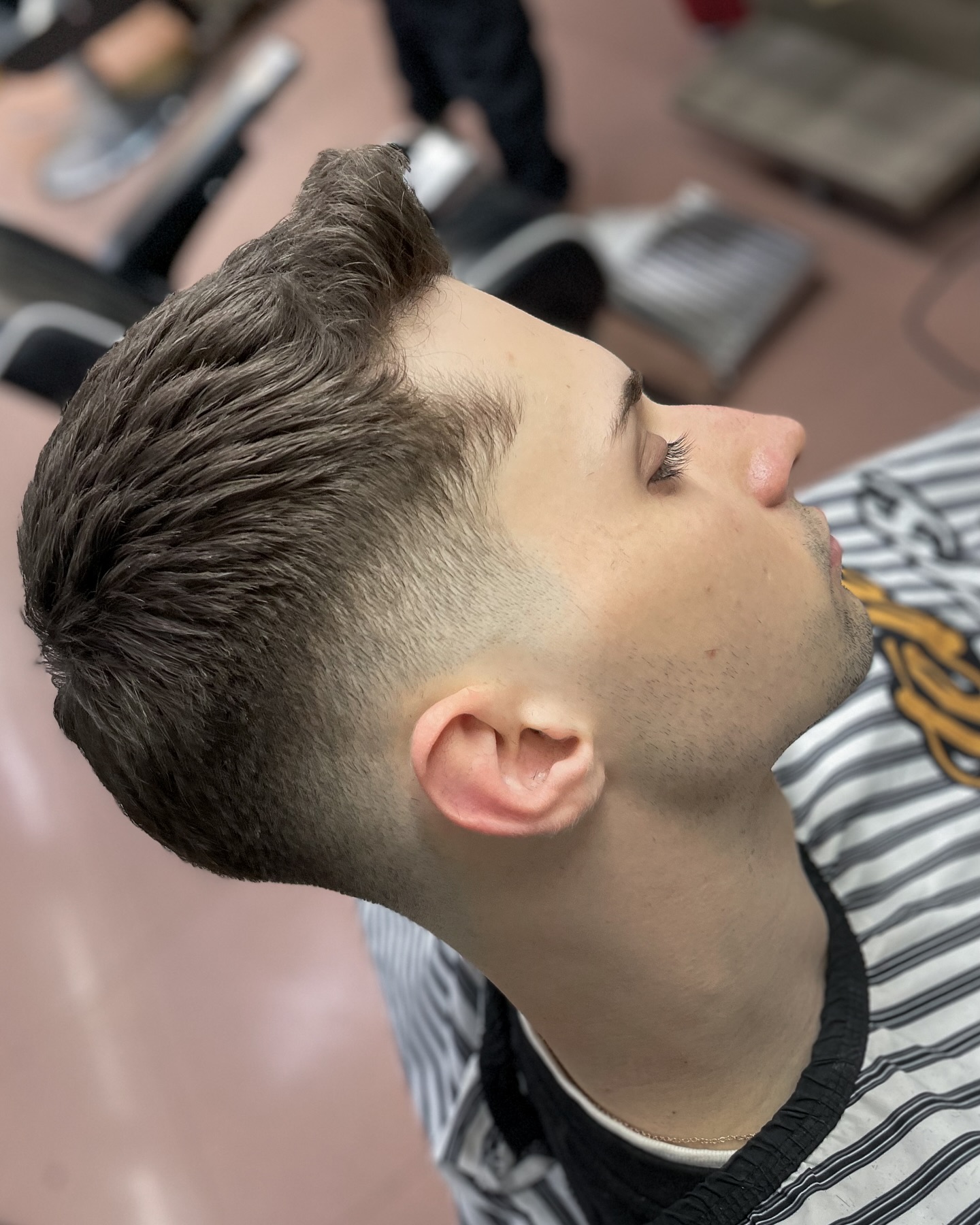 Polished Quiff with Crisp Gradual Fade