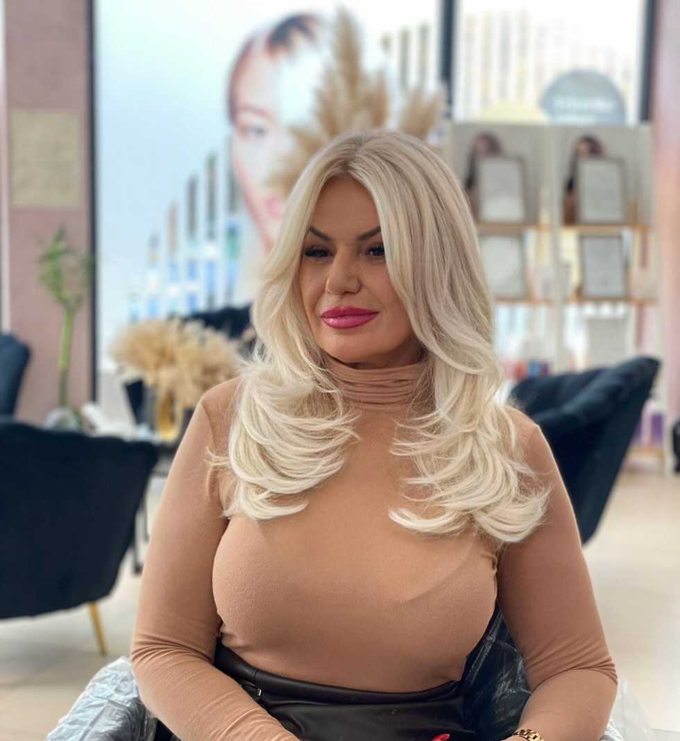 Silky Radiant Blonde Layers with Soft Volumizing Curls