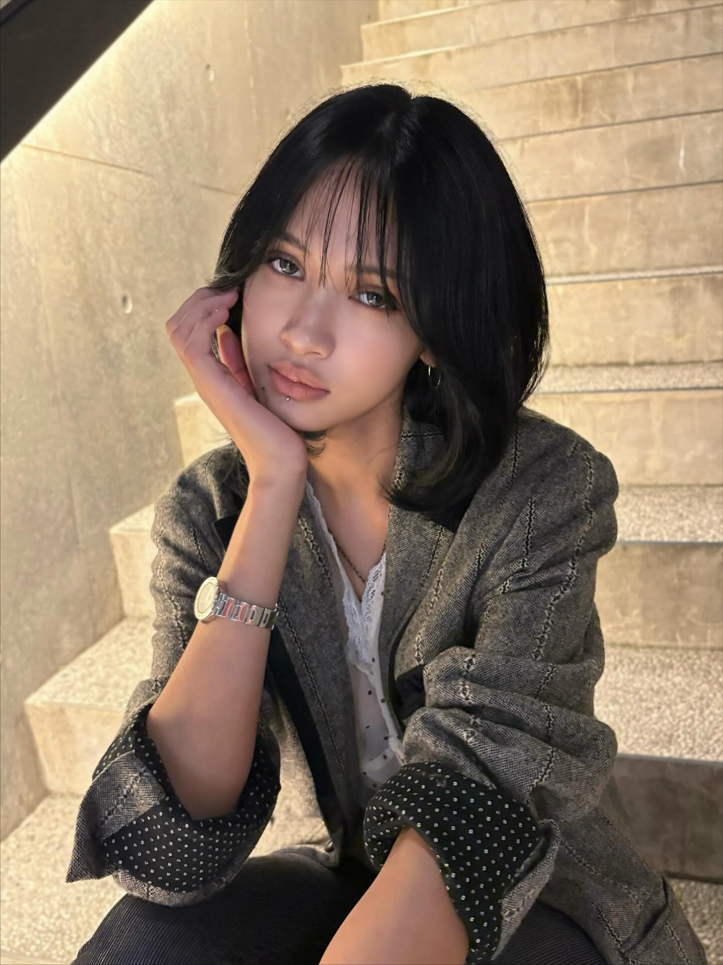 Sleek Jet-Black Bob with Feathered Fringe